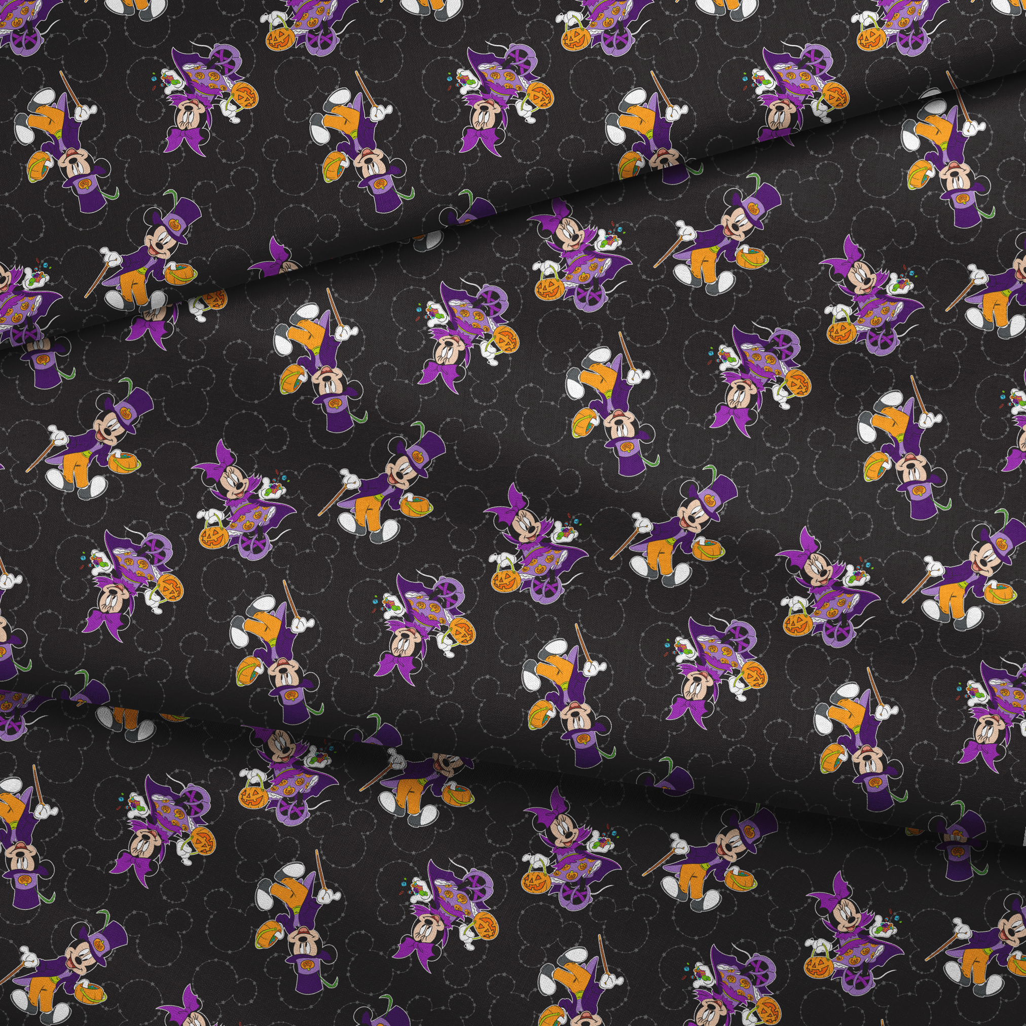 Mickey and Minnie in Halloween costumes on black background with purple, orange, and white details in a scattered pattern fabric fold mockup