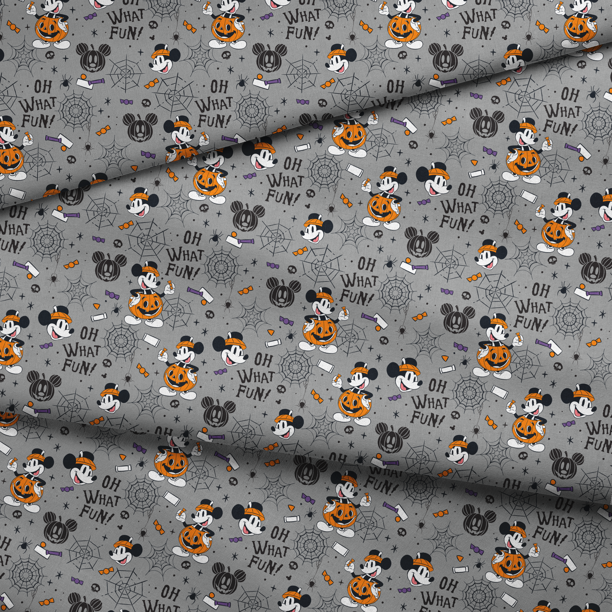 Halloween pattern with Mickey Mouse characters, pumpkins, spider webs, and "Oh What Fun!" text on gray background fabric fold mockup