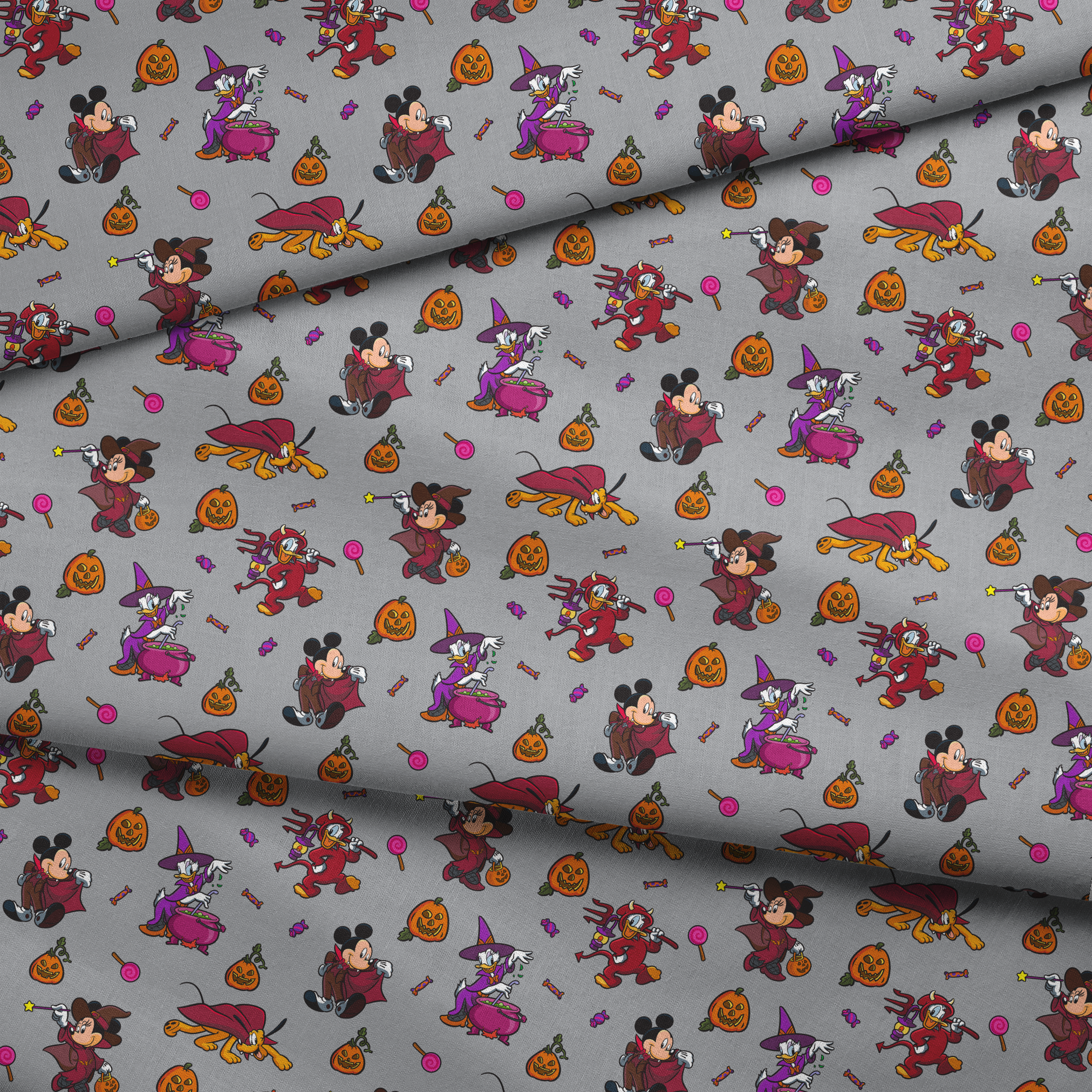 Halloween-themed cartoon pattern with Mickey Mouse characters in costumes, pumpkins, candy, and cauldrons on gray background fabric fold mockup