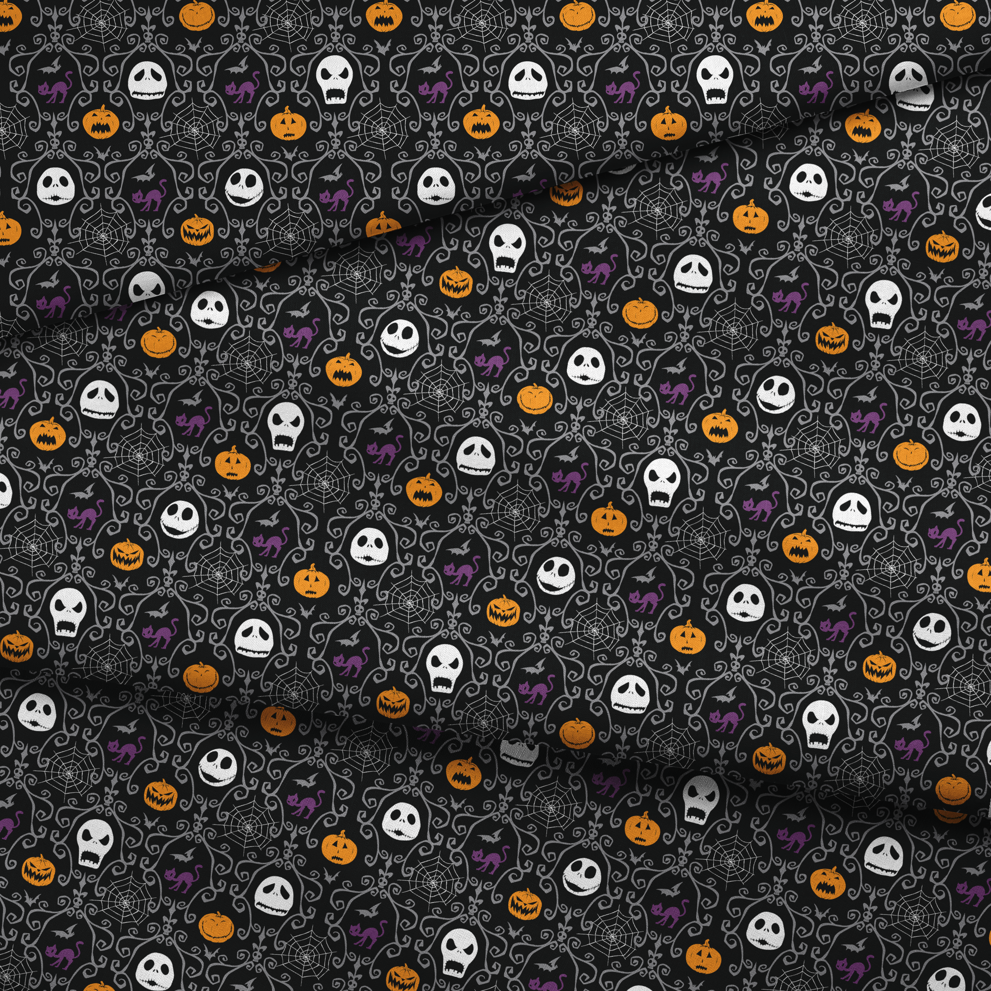 Nightmare Before Christmas pattern with skulls, pumpkins, bats and ornate swirls on black background fabric fold mockup