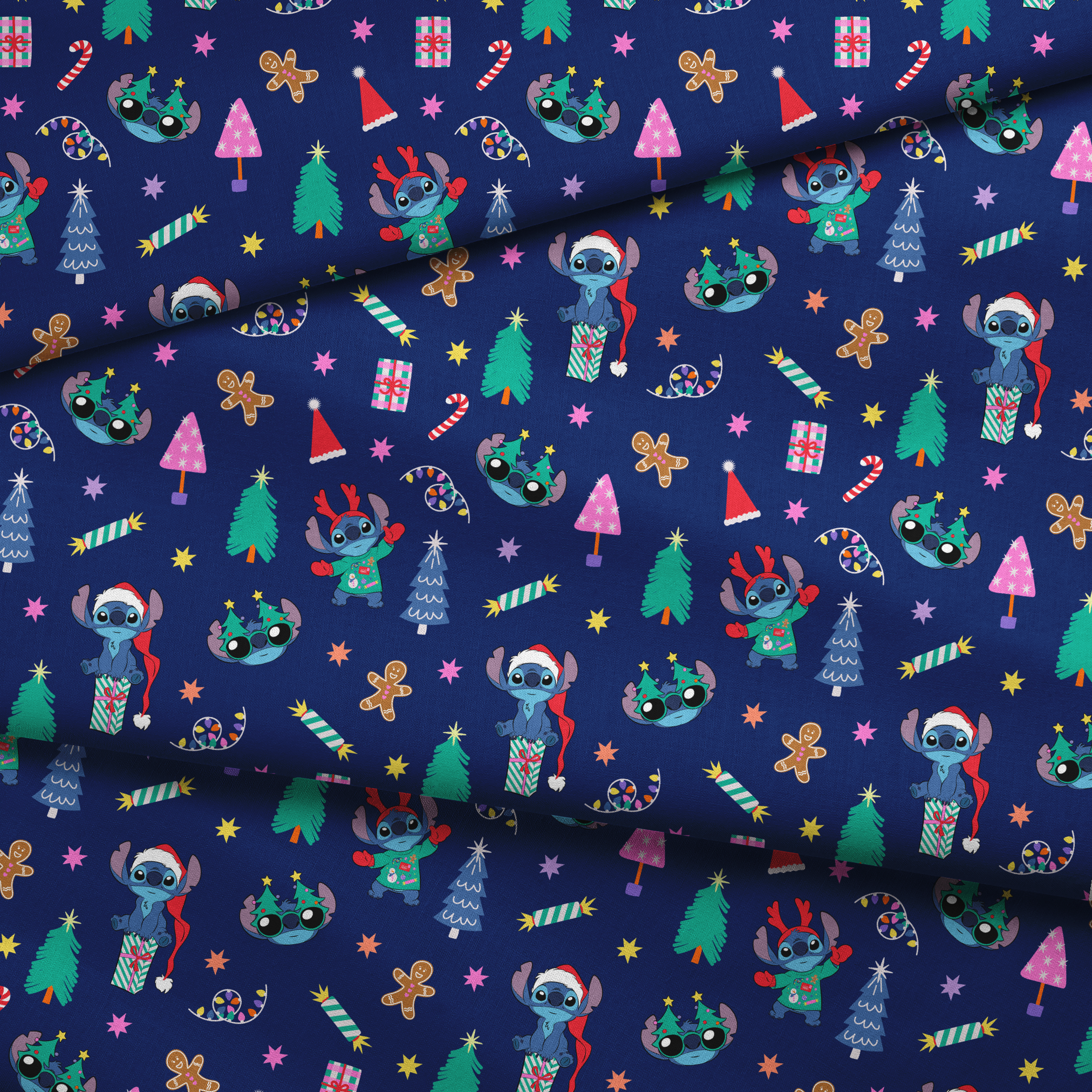 Festive Christmas pattern with Stitch, trees, candy canes, presents, and gingerbread men on navy background fabric fold mockup