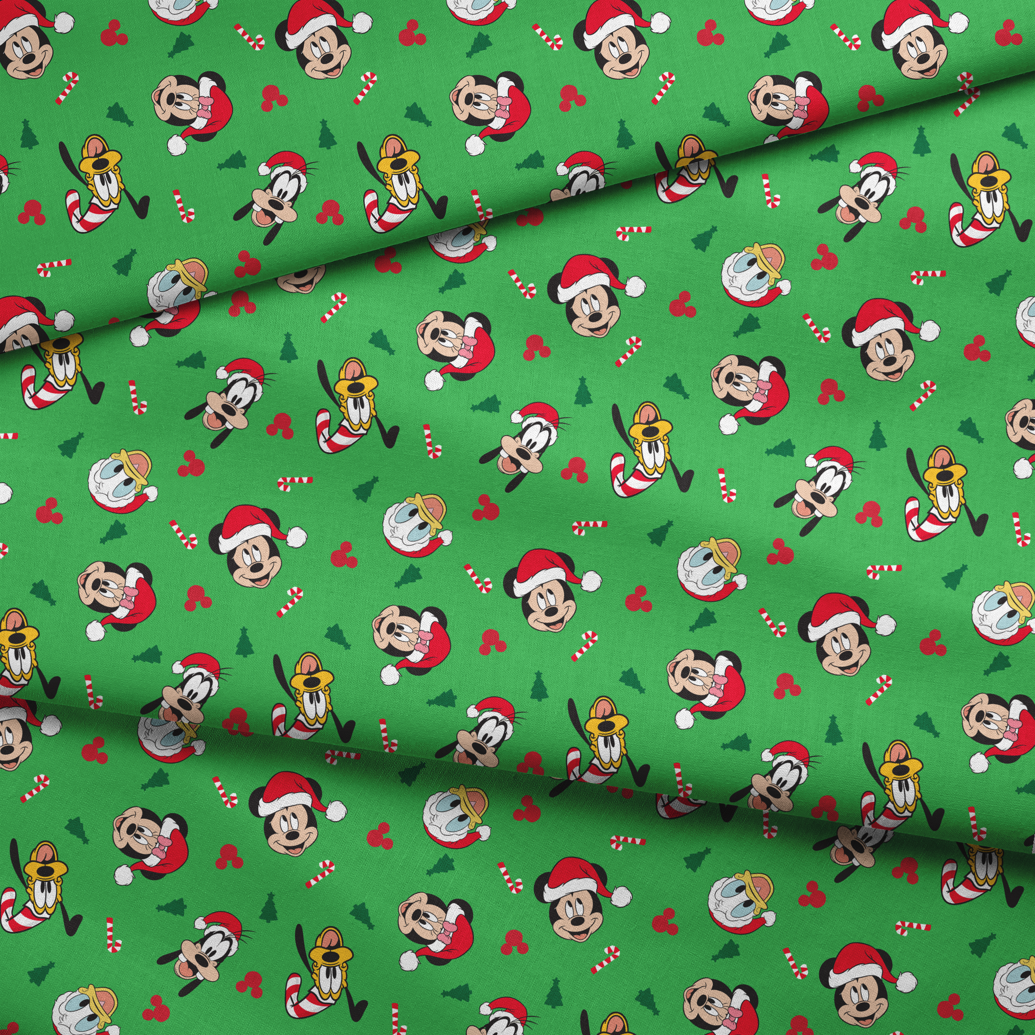 Disney Mickey Mouse characters in Santa hats on green background with candy canes and Christmas trees fabric fold mockup