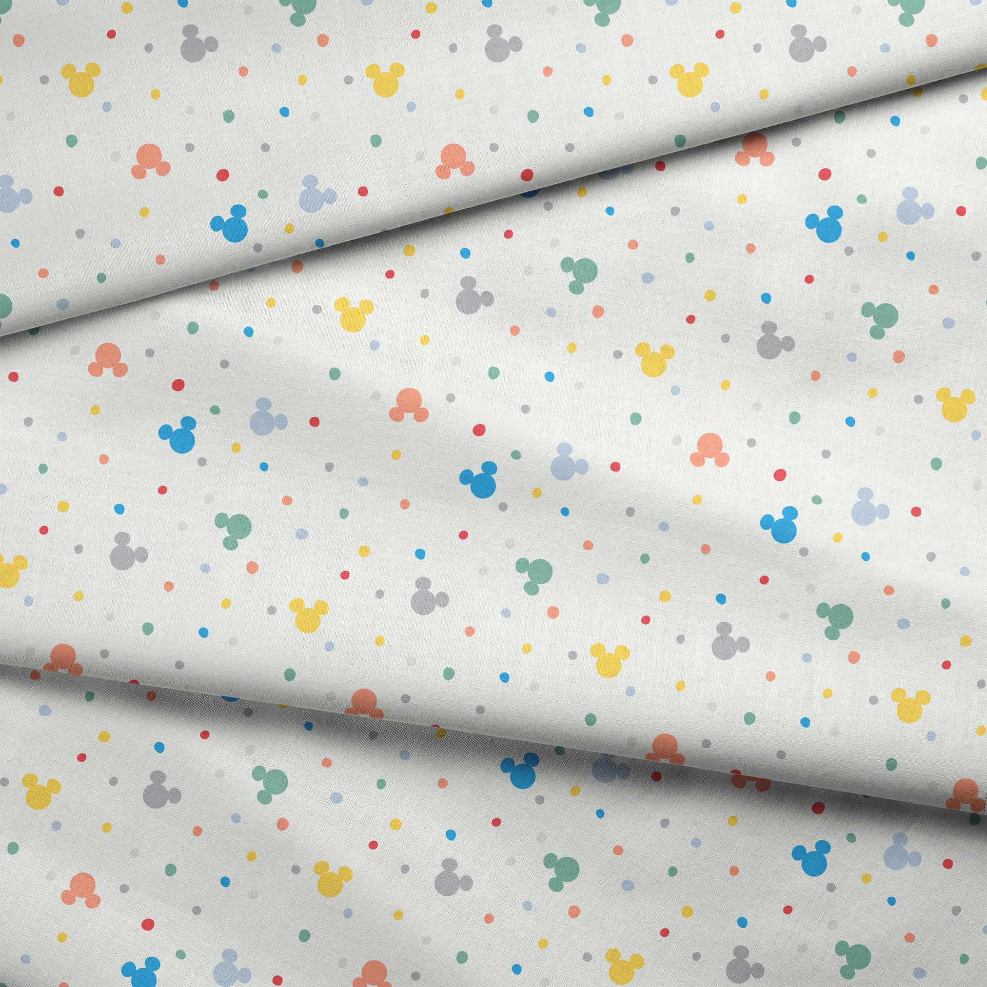 Colorful Disney Mickey Mouse silhouette pattern with pastel dots on white background fabric fold mockup