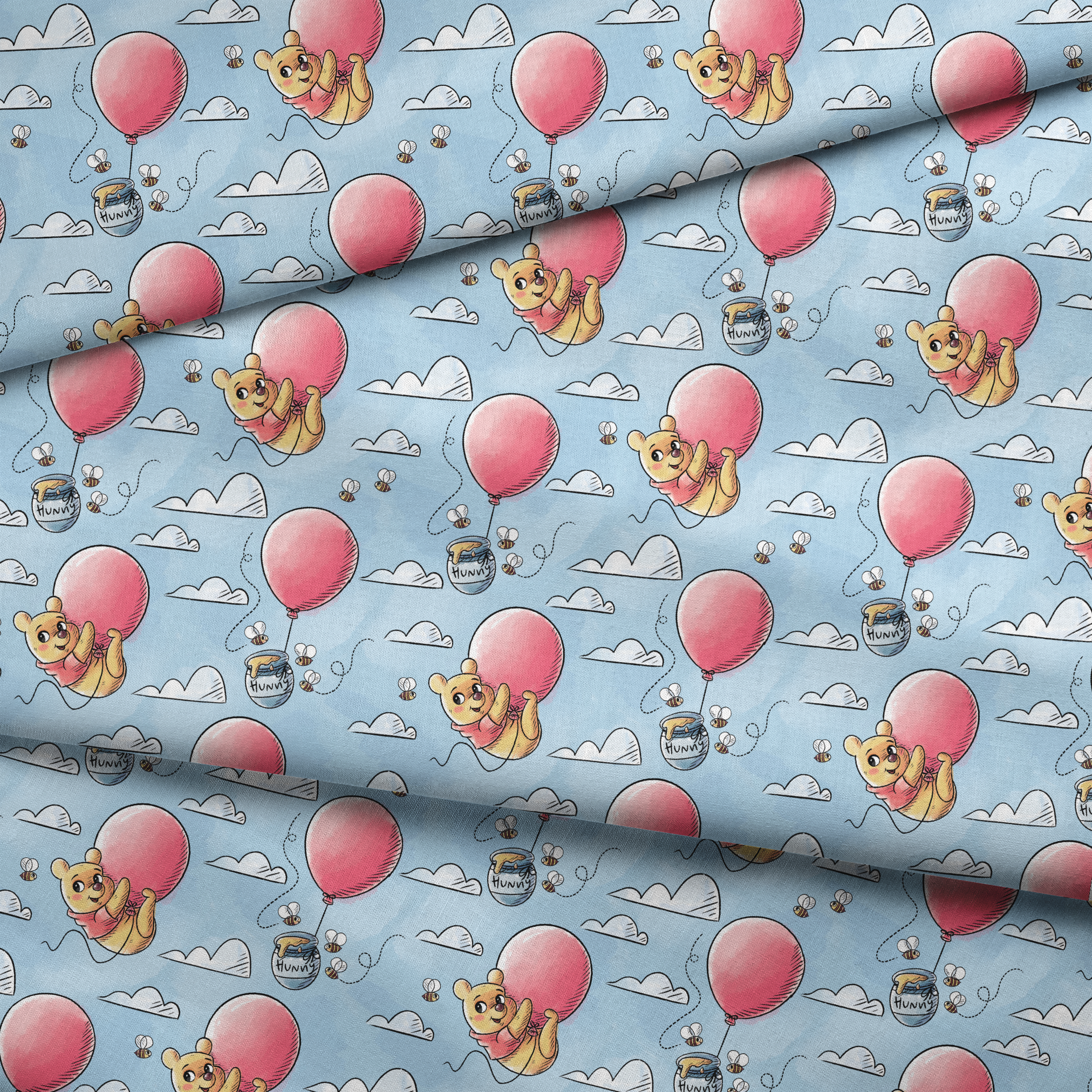 Cute yellow bear characters floating with pink balloons and honey pots against a blue sky with cl... fabric fold mockup