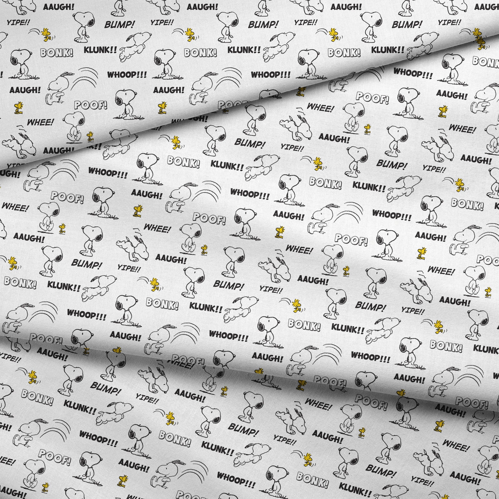 Comic-style pattern of Snoopy and Woodstock with sound effect words like "BONK!", "KLUNK!" and "BUMP!" in black and white. fabric fold mockup