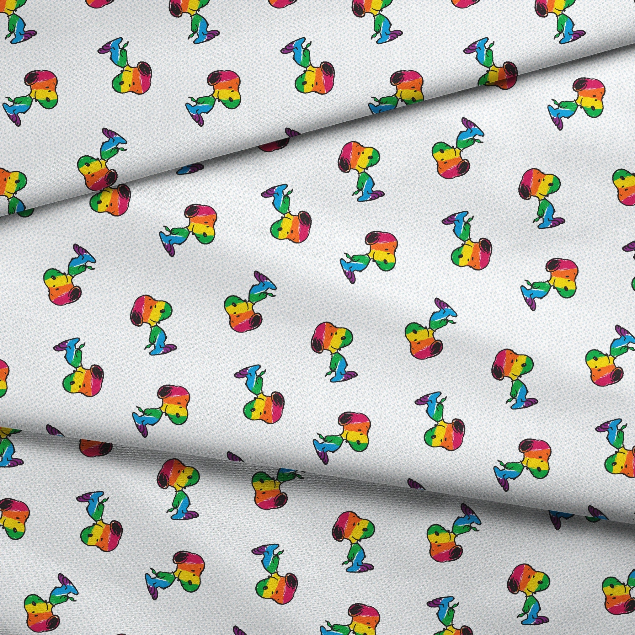 Colorful rainbow Snoopy in various poses on a dotted white background fabric fold mockup