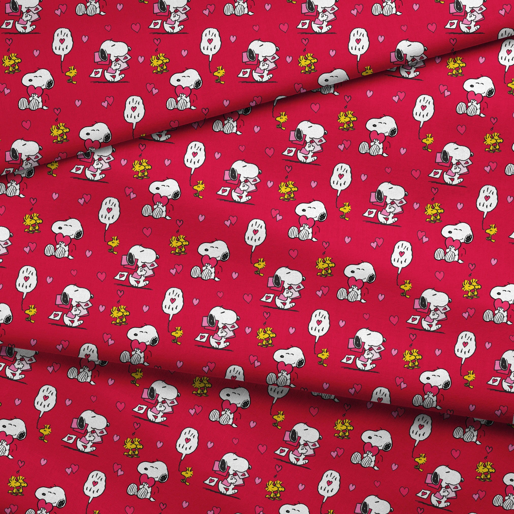 Snoopy and Woodstock pattern with hearts on bright red background, Valentine's theme fabric fold mockup