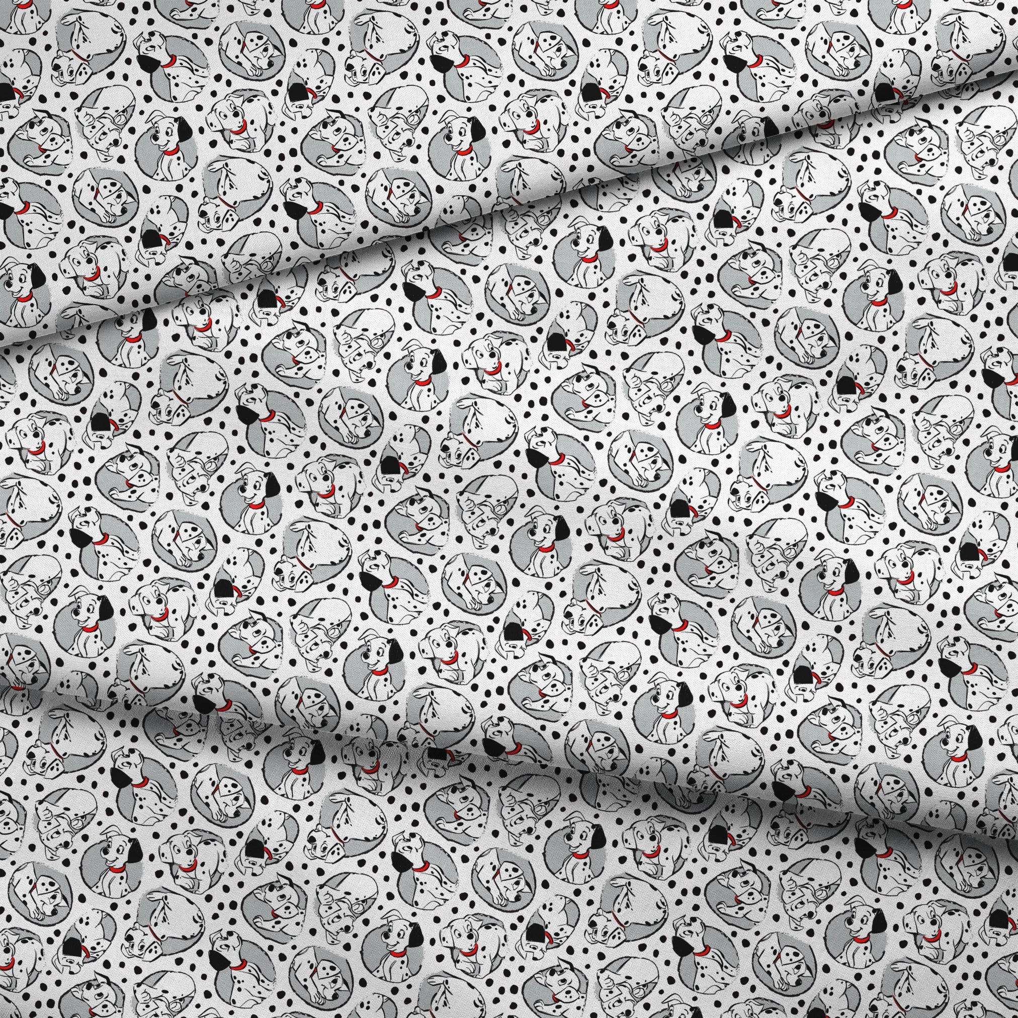 Cartoon pattern of Dalmatian puppies with black spots and red collars on white background fabric fold mockup