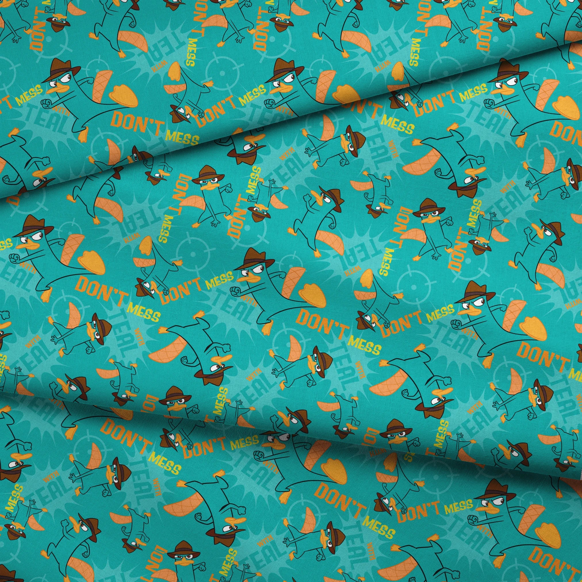 Cartoon pattern of platypus character in fedora hat with orange elements on teal background fabric fold mockup