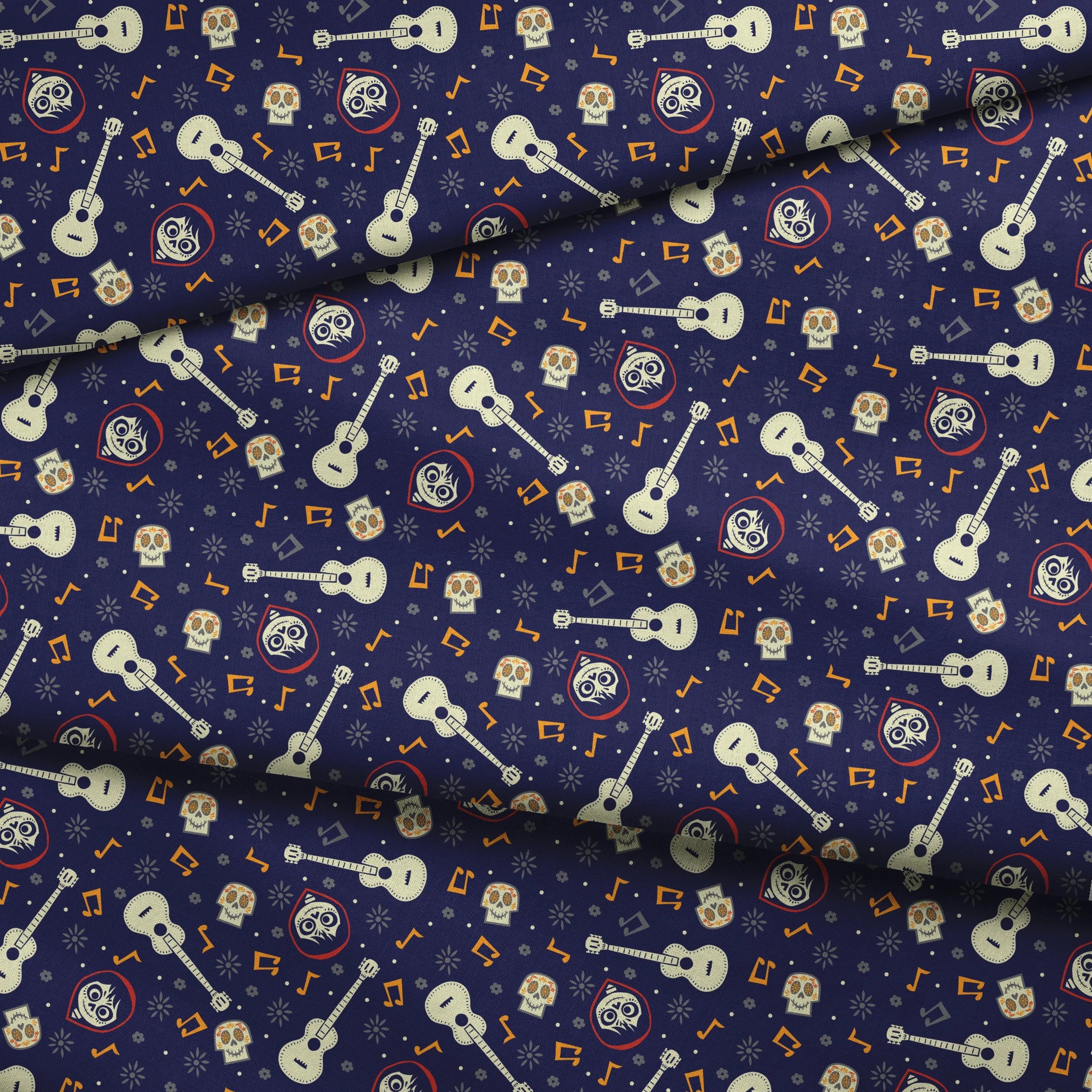 Coco dark blue pattern with white acoustic guitars, decorative skulls, orange musical notes, and circular designs scattered across a starry background. fabric fold mockup