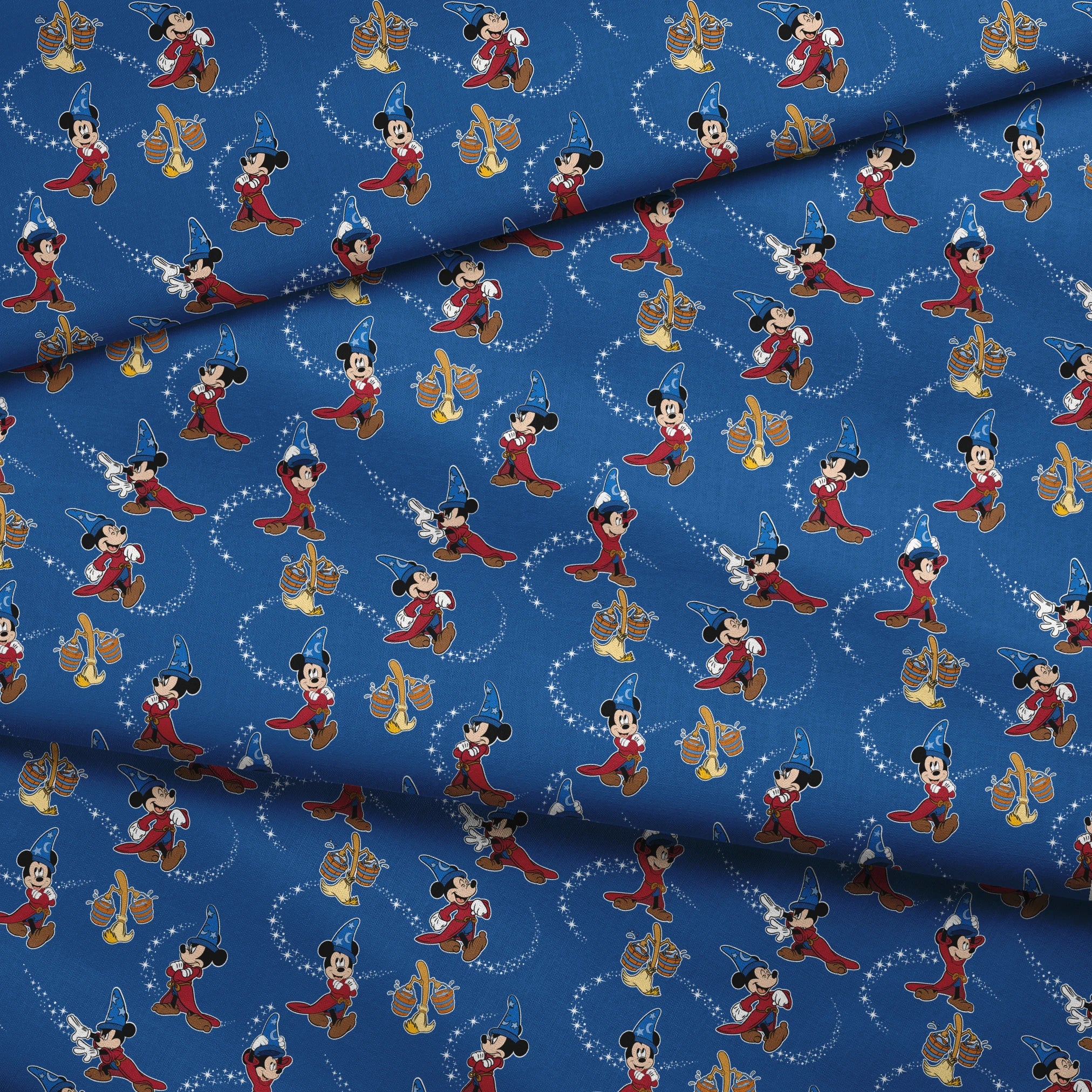 Mickey Mouse as Fantasia's Sorcerer's Apprentice in various poses with magic stars on blue background. fabric fold mockup