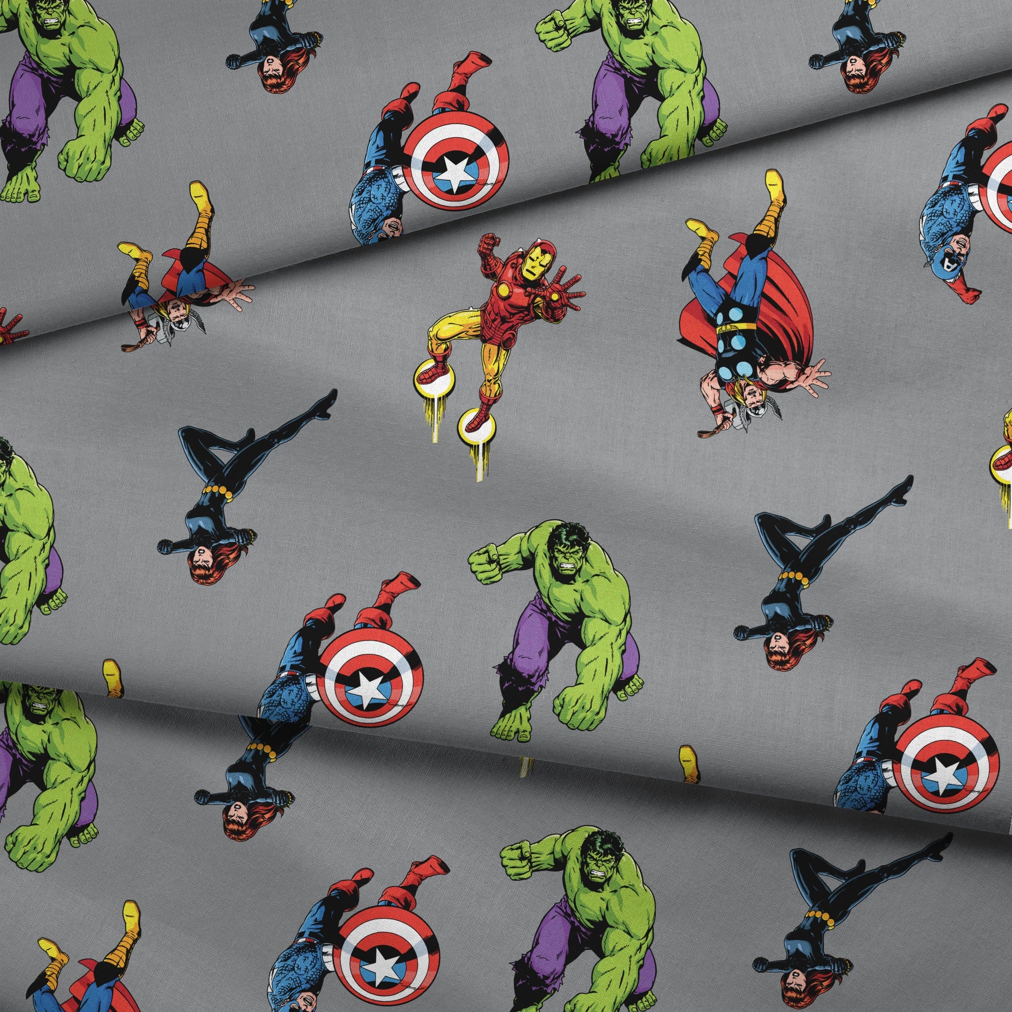 Marvel superheroes pattern with Hulk, Thor, Captain America, and Iron Man on gray background fabric fold mockup