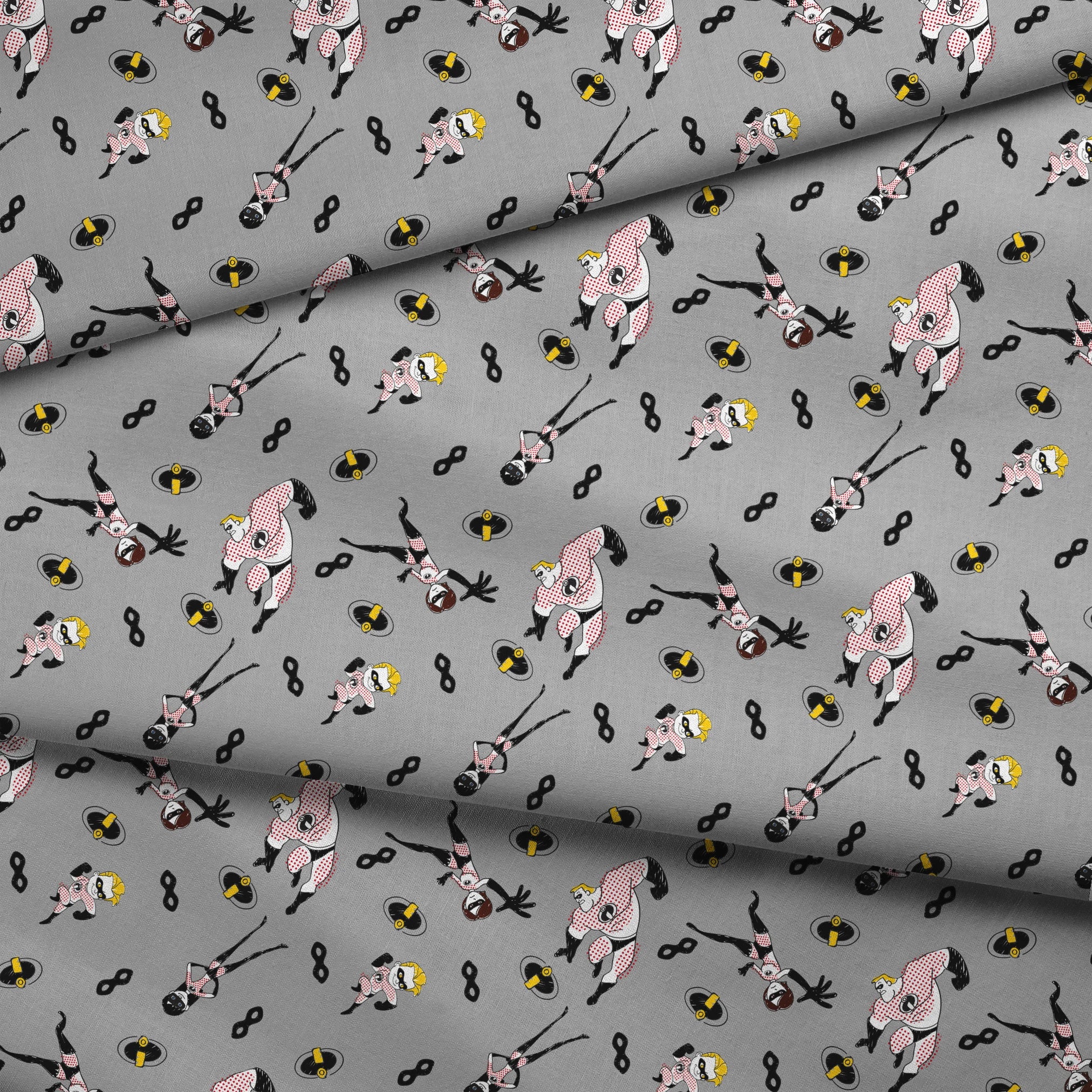 The Incredibles in black and white suits with yellow emblems scattered on gray background with masks fabric fold mockup