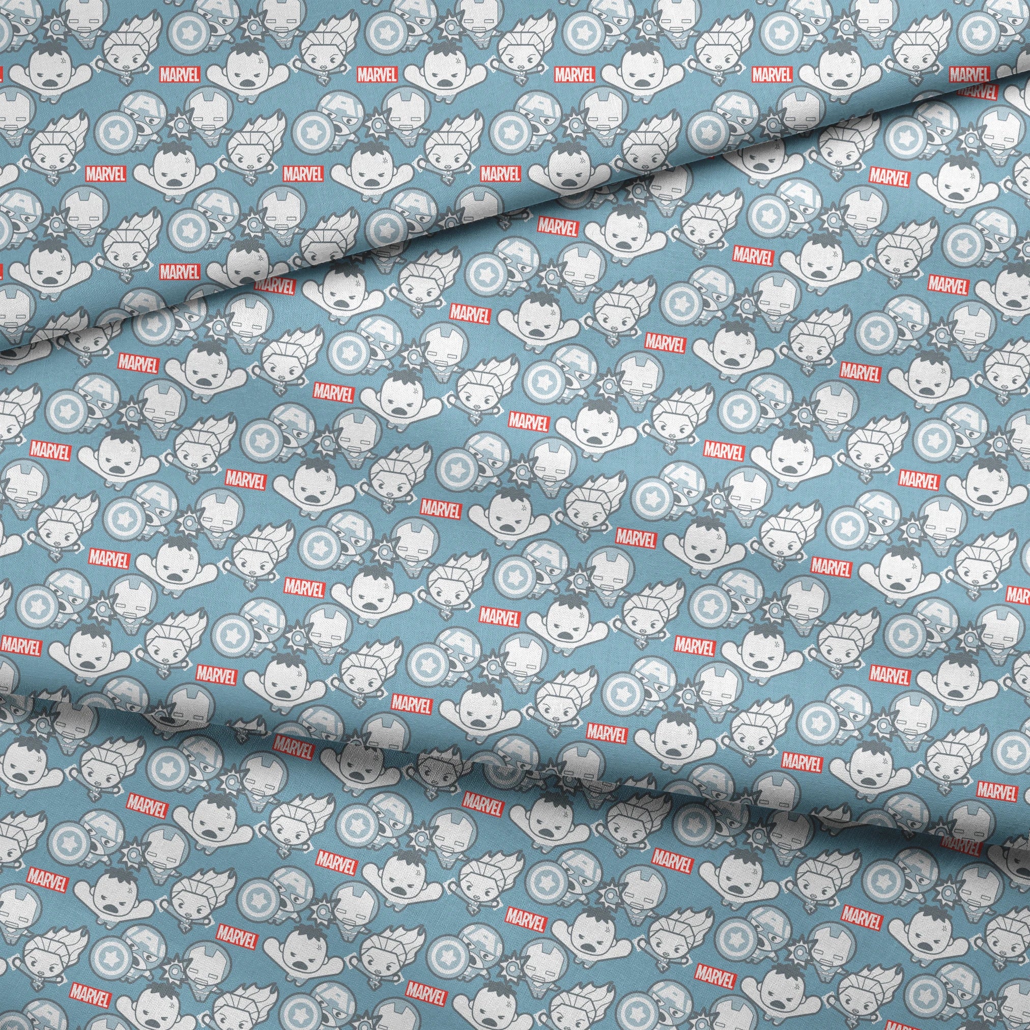 Marvel kawaii superhero pattern with cartoon characters, shields, and gear symbols on blue background fabric fold mockup