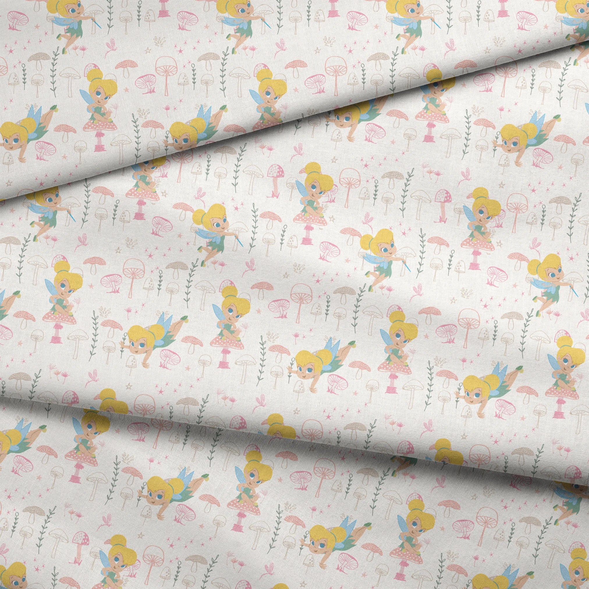 Whimsical pattern with cartoon fairy characters and pink mushrooms against a cream background fabric fold mockup