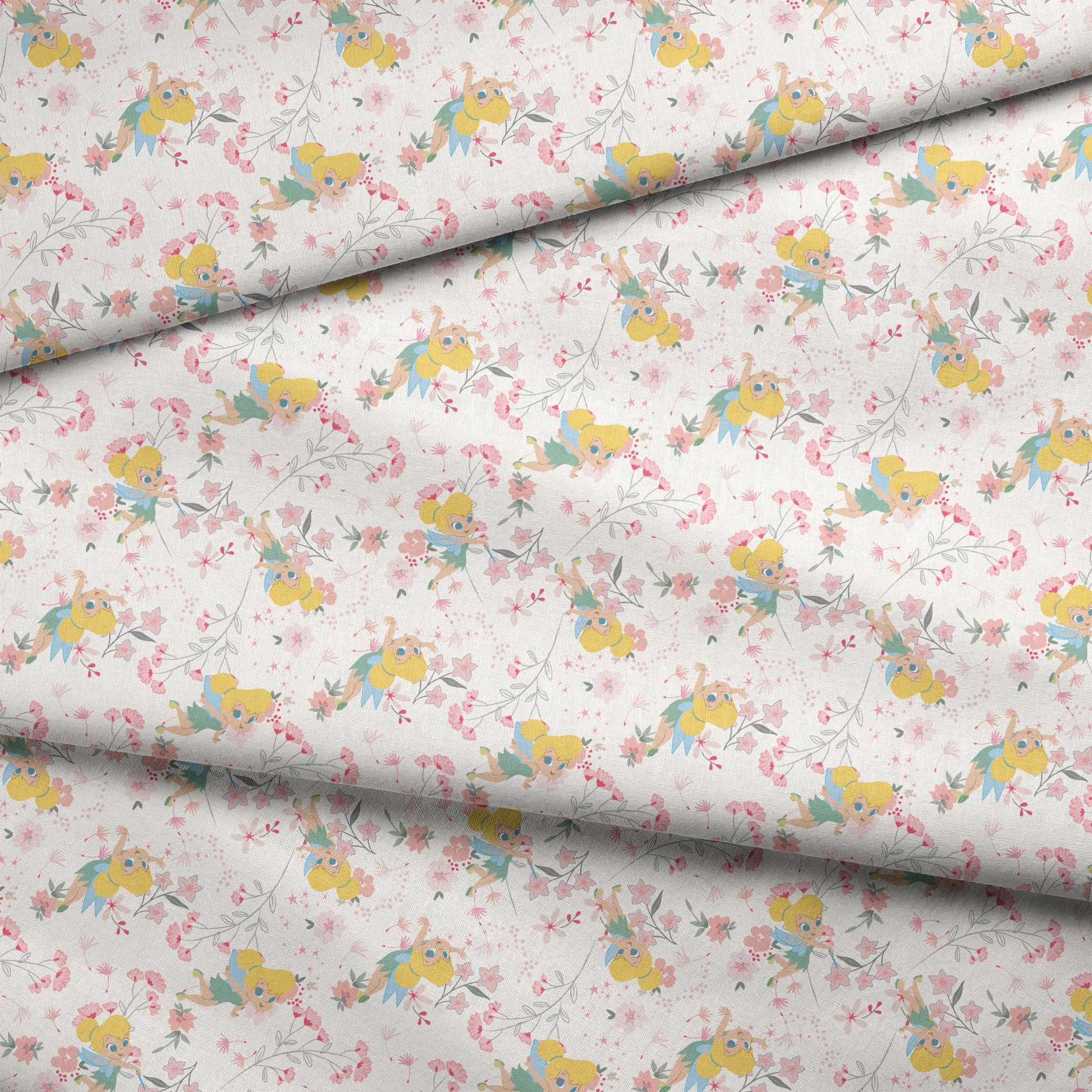 Whimsical pattern with Tinker Bell among pink flowers and green leaves on white background fabric fold mockup