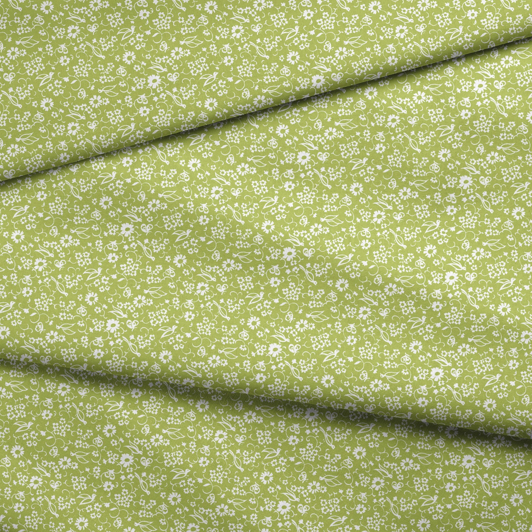 White bird and floral pattern on a vibrant lime green background. fabric fold mockup