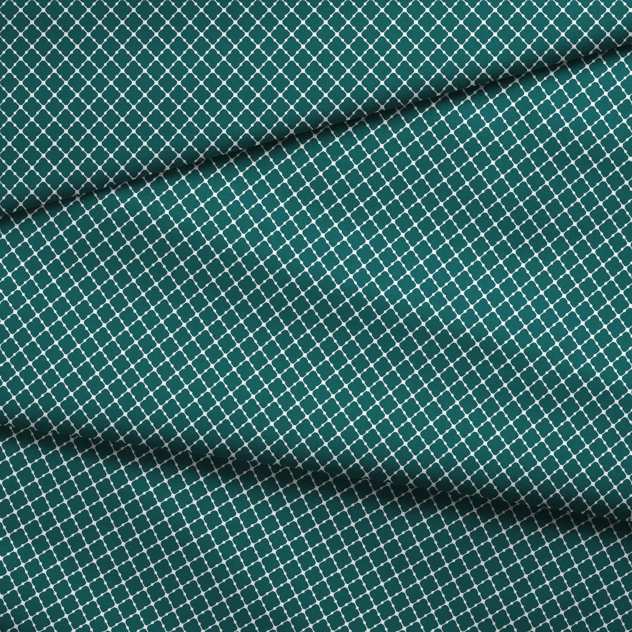 Dark teal quatrefoil pattern with white lattice outlines on a geometric background fabric fold mockup