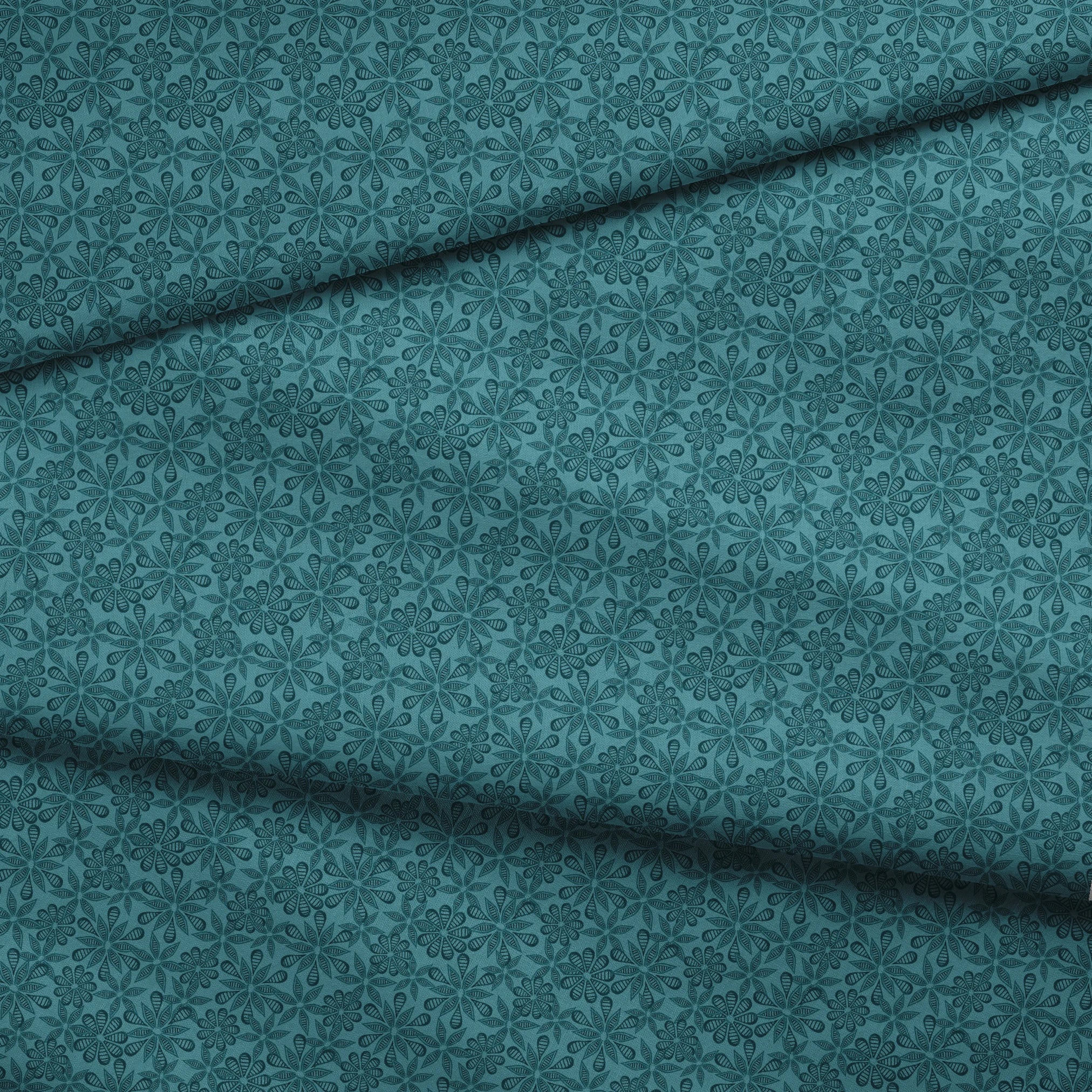 Outlined floral pattern in dark teal on a lighter teal background by Nicole Tamarin. fabric fold mockup