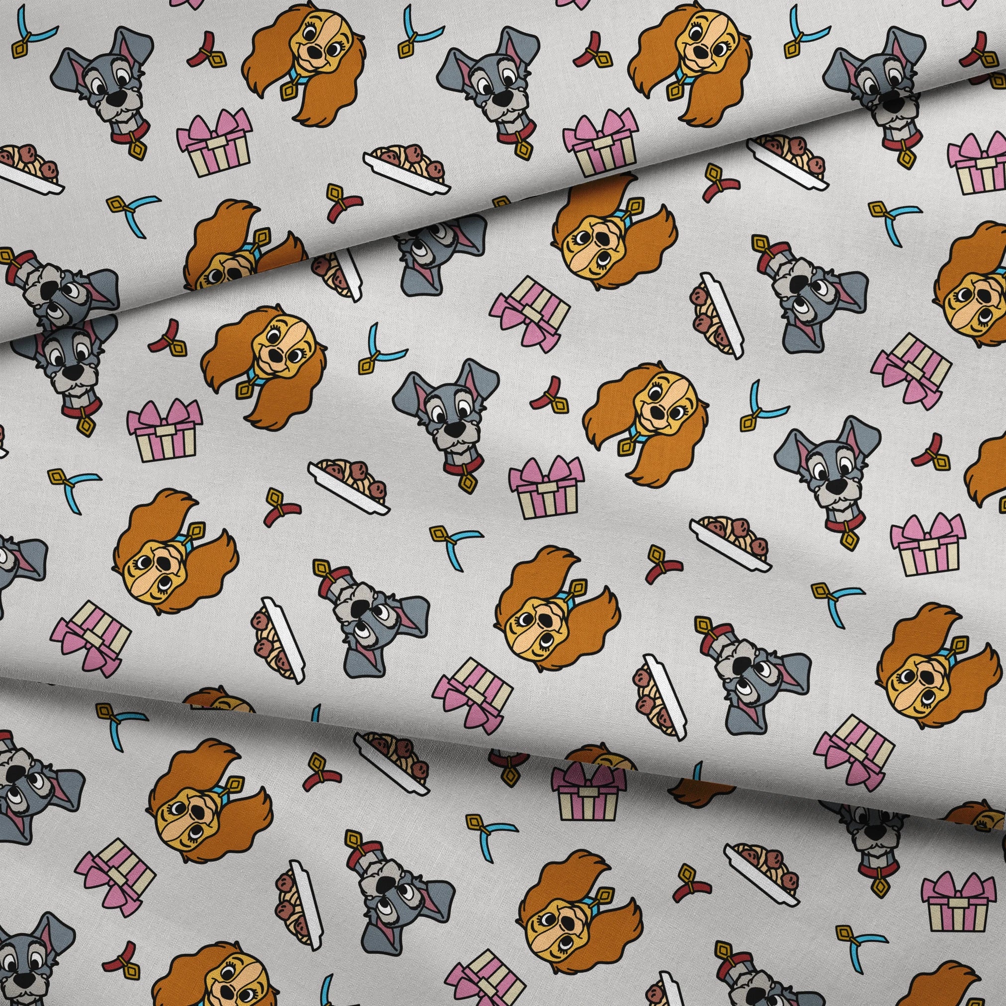 Cartoon pattern featuring Lady and Tramp dogs, gift boxes, bones, and ribbons on light gray background fabric fold mockup