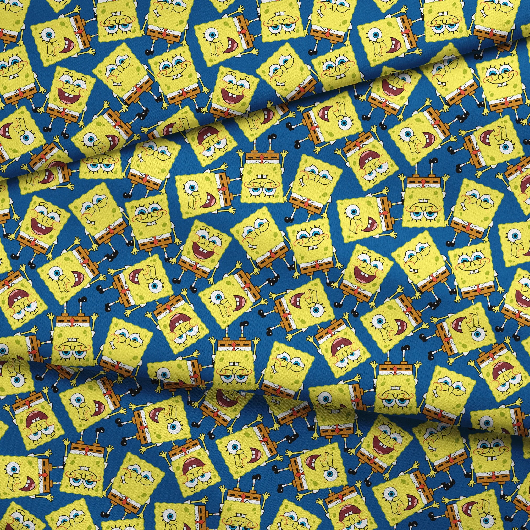 SpongeBob SquarePants pattern featuring various expressions on blue background fabric fold mockup