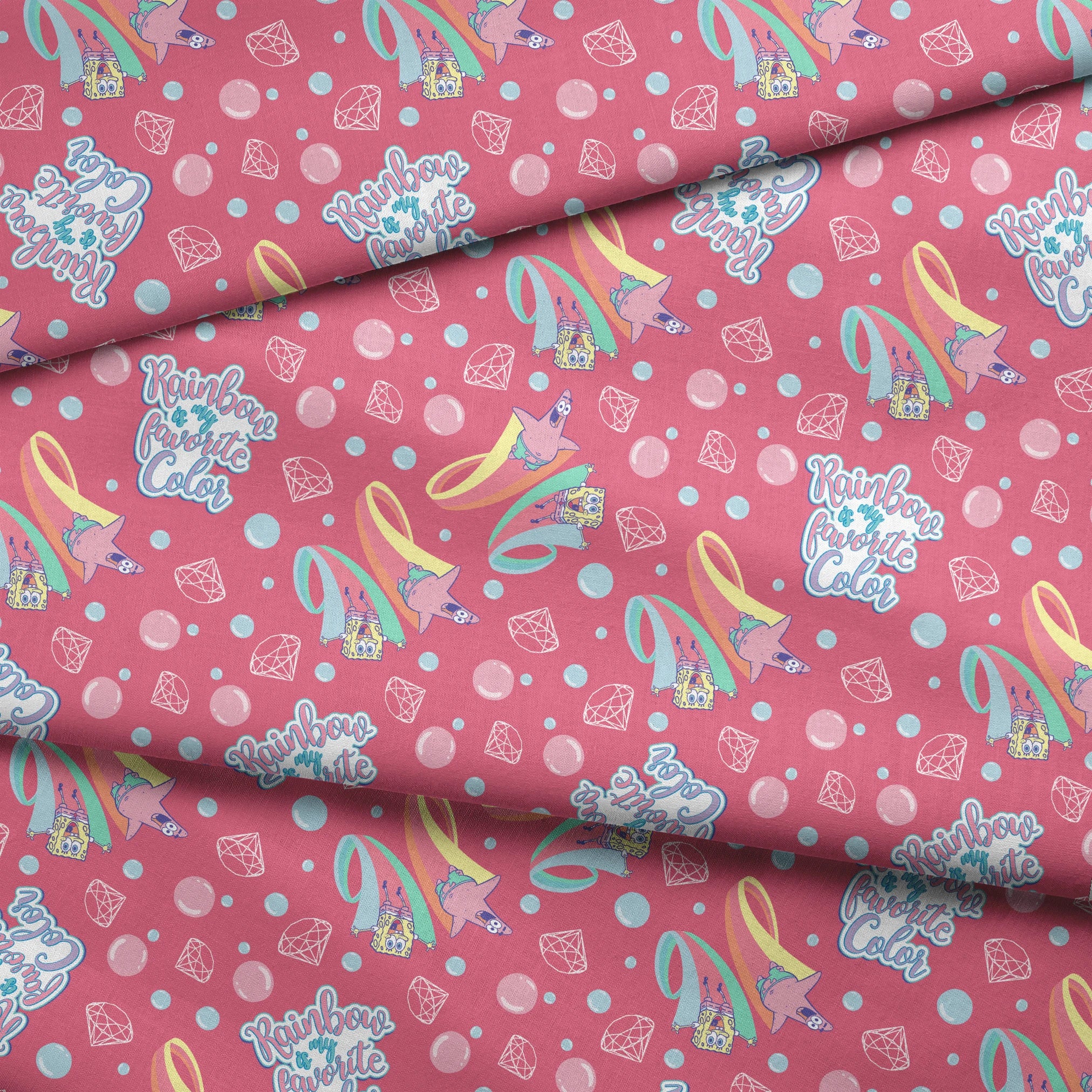 Patrick Star floats among pastel rainbows, bubbles, and gems on a pink background with the phrase “Rainbow is my favorite color” in a SpongeBob design fabric fold mockup