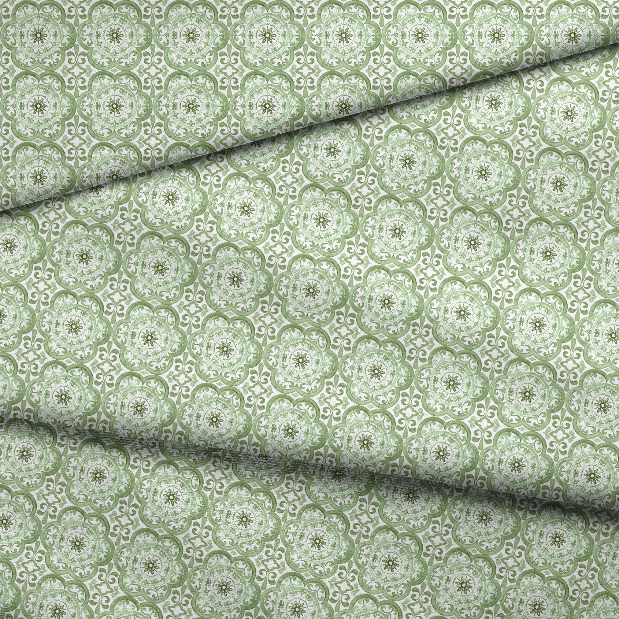 Green medallion tile-inspired pattern by Nicole Tamarin, featuring ornate floral details in a repeating square layout. fabric fold mockup