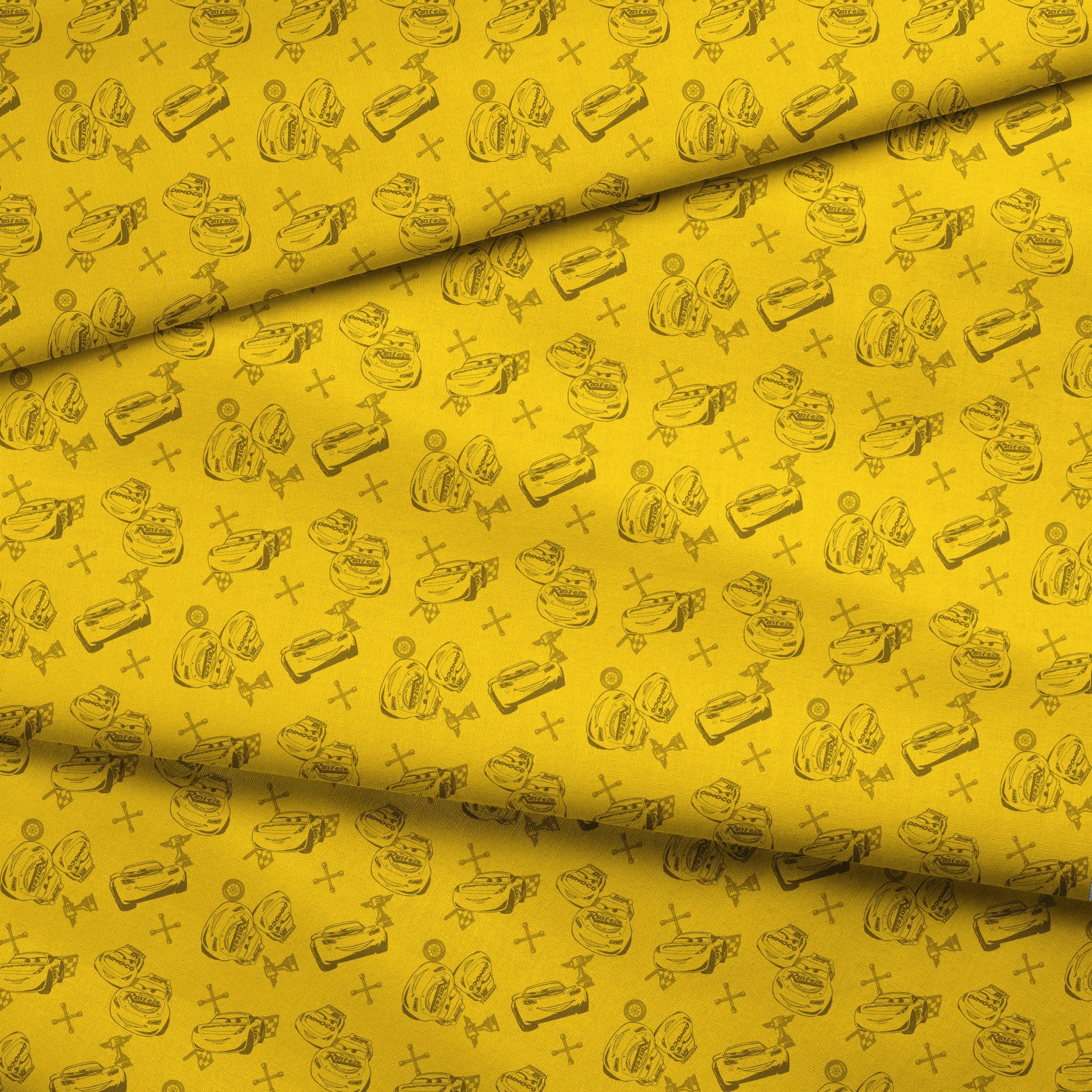 Yellow background with cartoon race cars, tires, and tool icons in a repeating pattern design fabric fold mockup