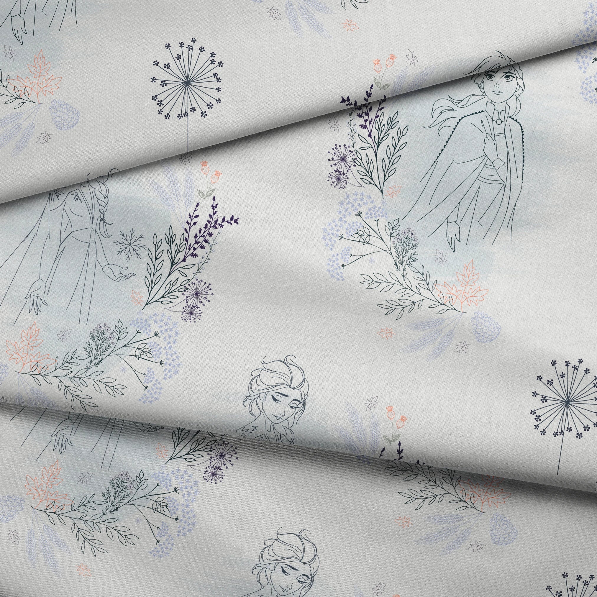 Delicate blue pattern featuring Frozen's Elsa and Anna surrounded by floral elements and dandelions on a light background fabric fold mockup