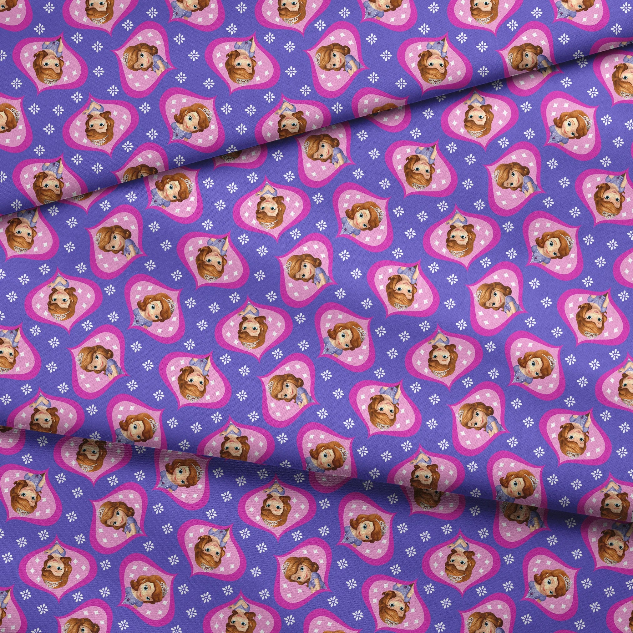 Sofia the First in pink frames pattern with white accents on purple background fabric fold mockup