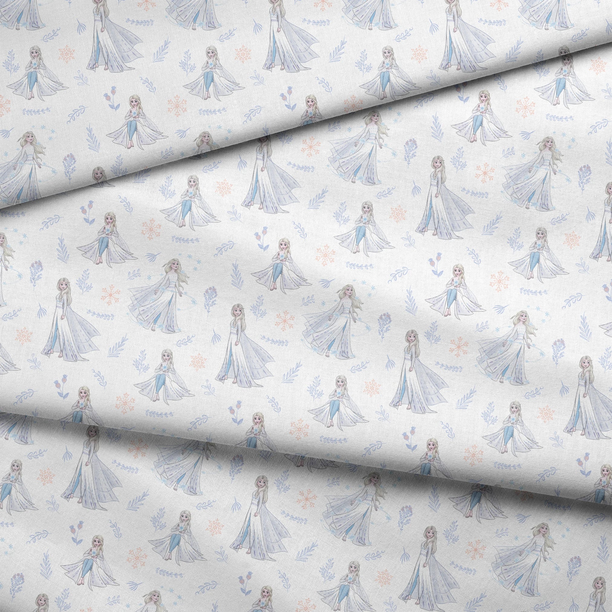 The image shows a decorative pattern featuringFrozen's Elsa, surrounded by delicate snowflakes, leaves, and floral elements in soft pastel colors on a light background. fabric fold mockup