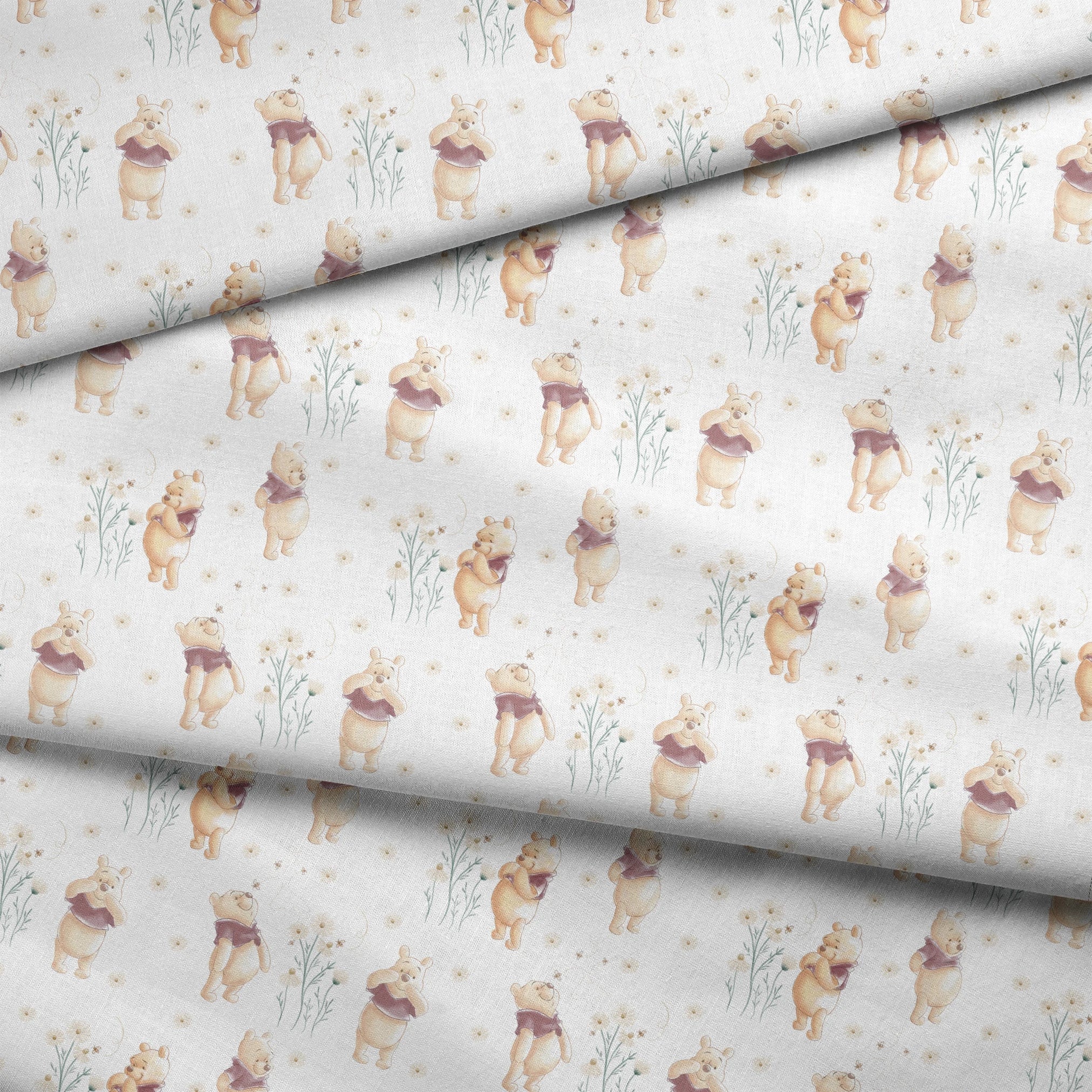 Winnie the Pooh pattern with cartoon bear in red shirt amid delicate white flowers fabric fold mockup