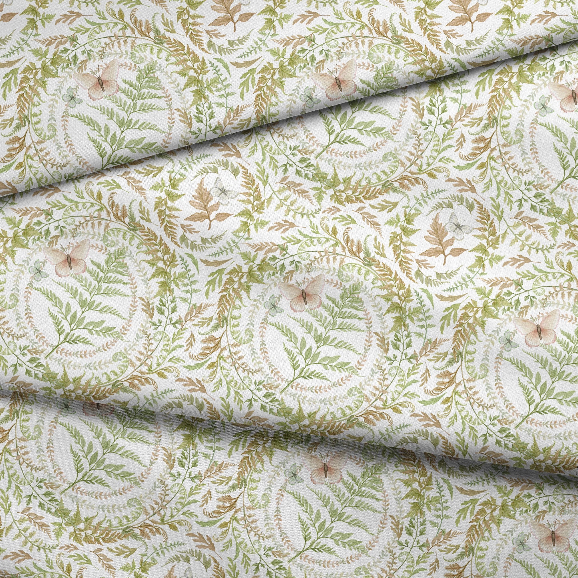 Circular botanical design featuring green ferns and blush butterflies on a white background in a Nicole Tamarin pattern. fabric fold mockup