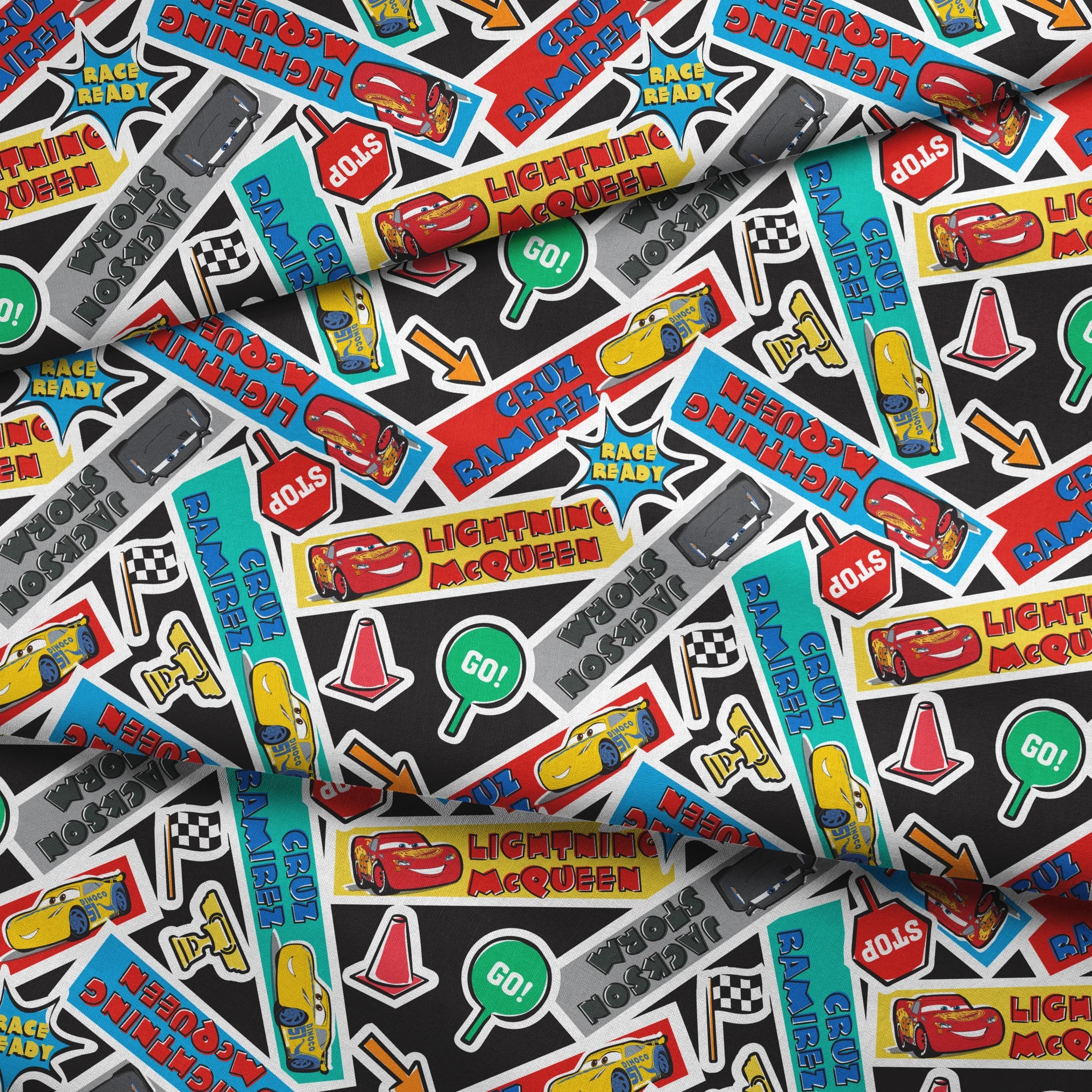 Colorful Cars movie stickers featuring Lightning McQueen, racing themes, and car motifs in vibrant colors. fabric fold mockup