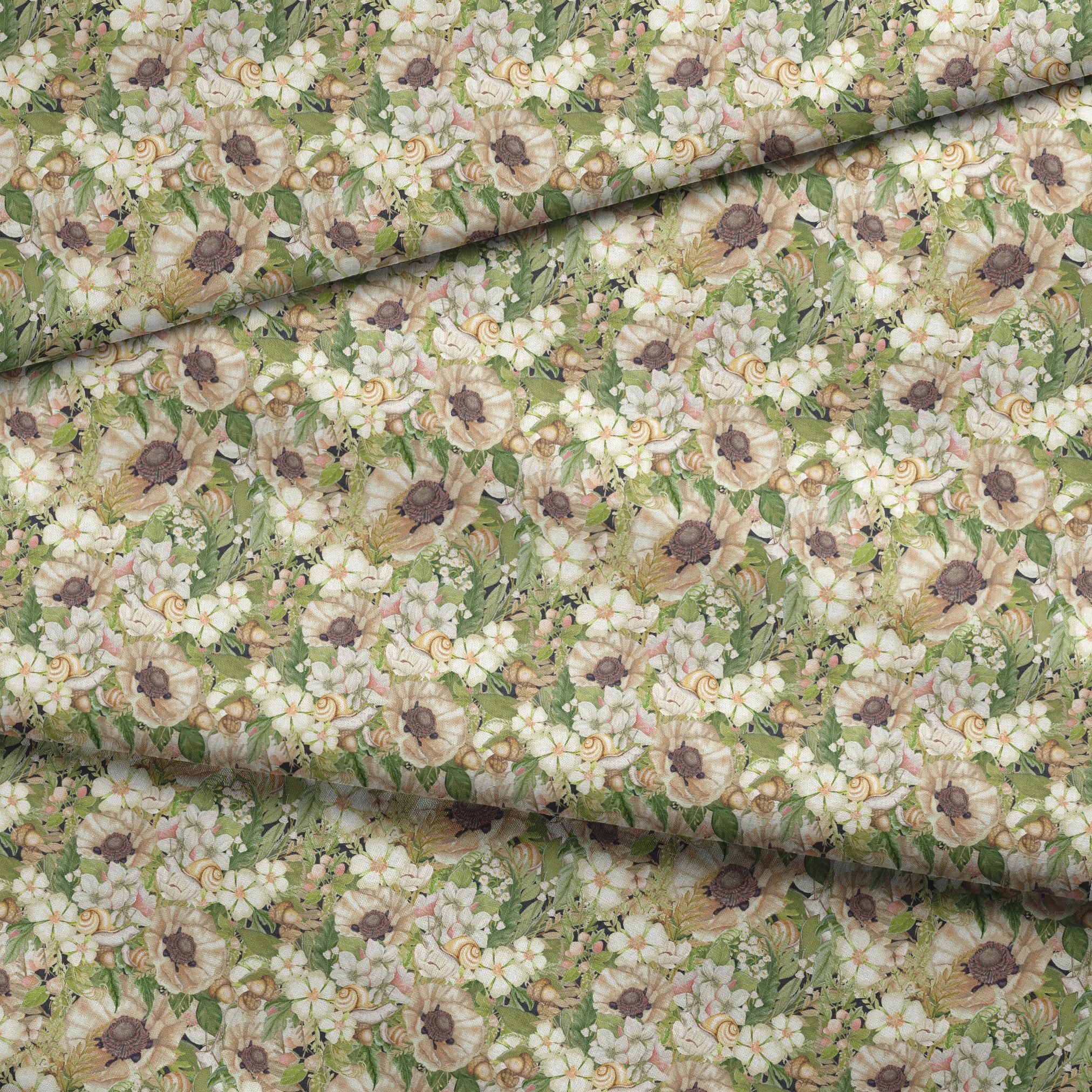 Botanical pattern by Nicole Tamarin featuring cream poppies, snails, acorns, and soft green leaves in an earthy woodland layout. fabric fold mockup