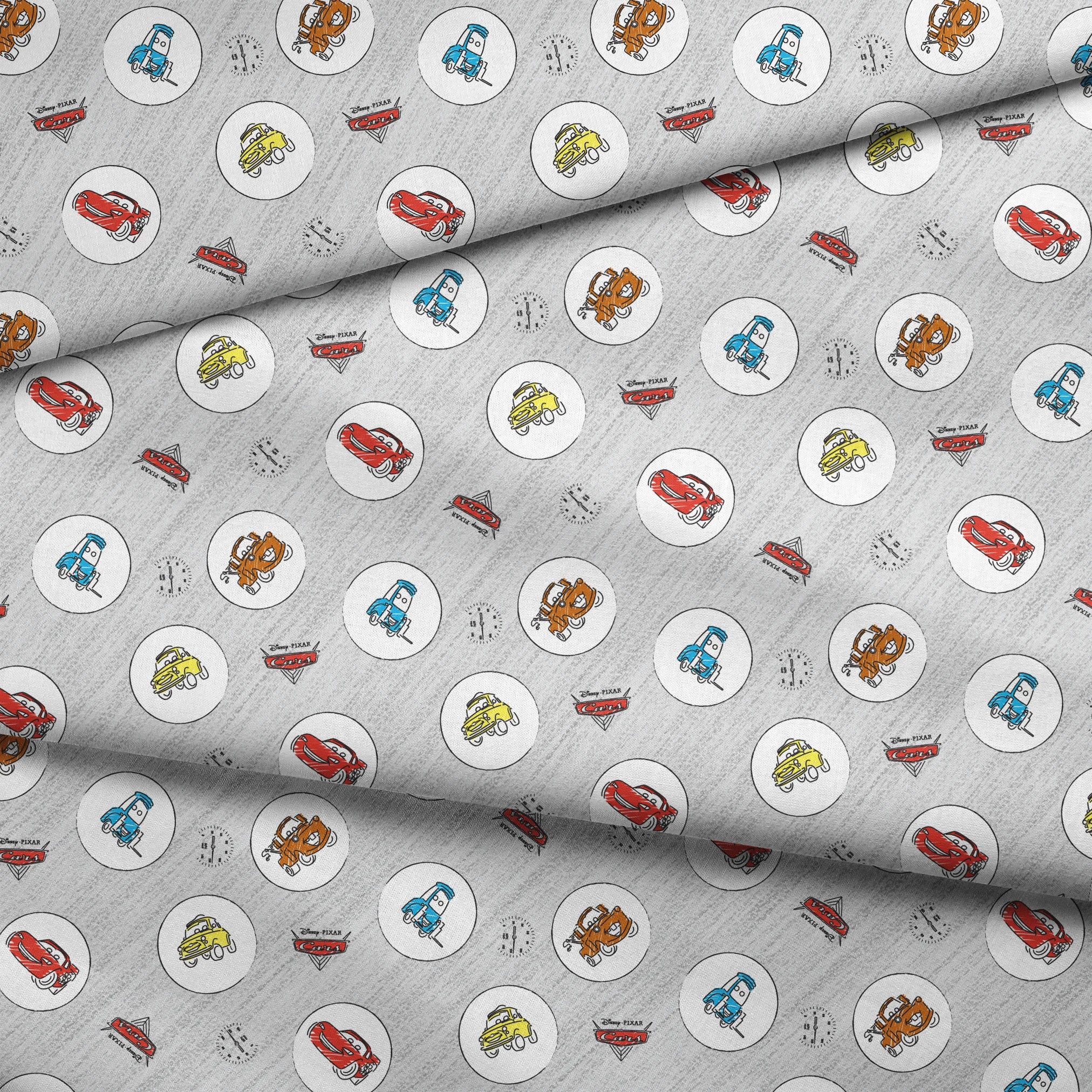 Cartoon Cars movie characters in white circles on a light gray sketched background with Cars logos fabric fold mockup