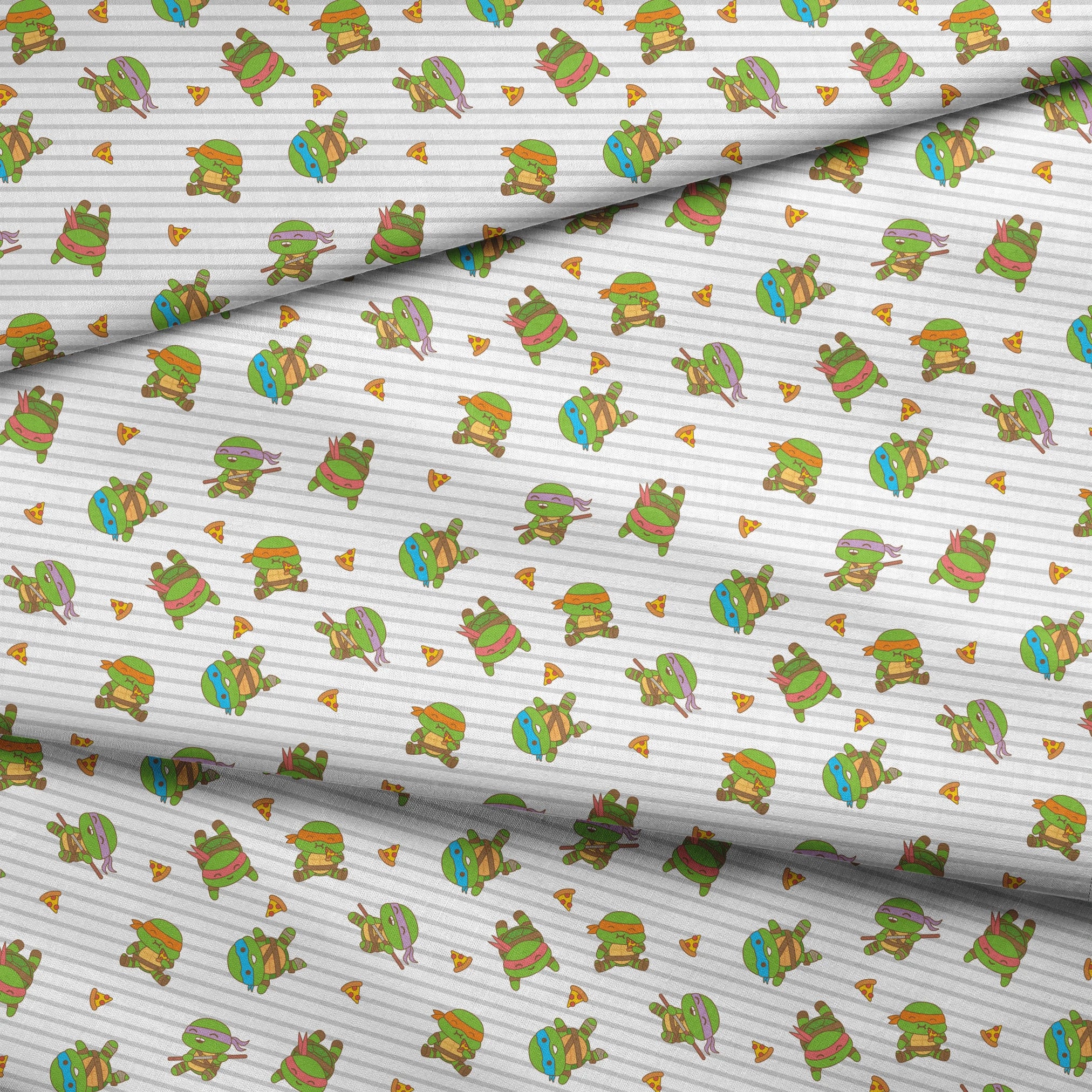 Teenage Mutant Ninja Turtles in various poses with pizza slices on gray striped background fabric fold mockup
