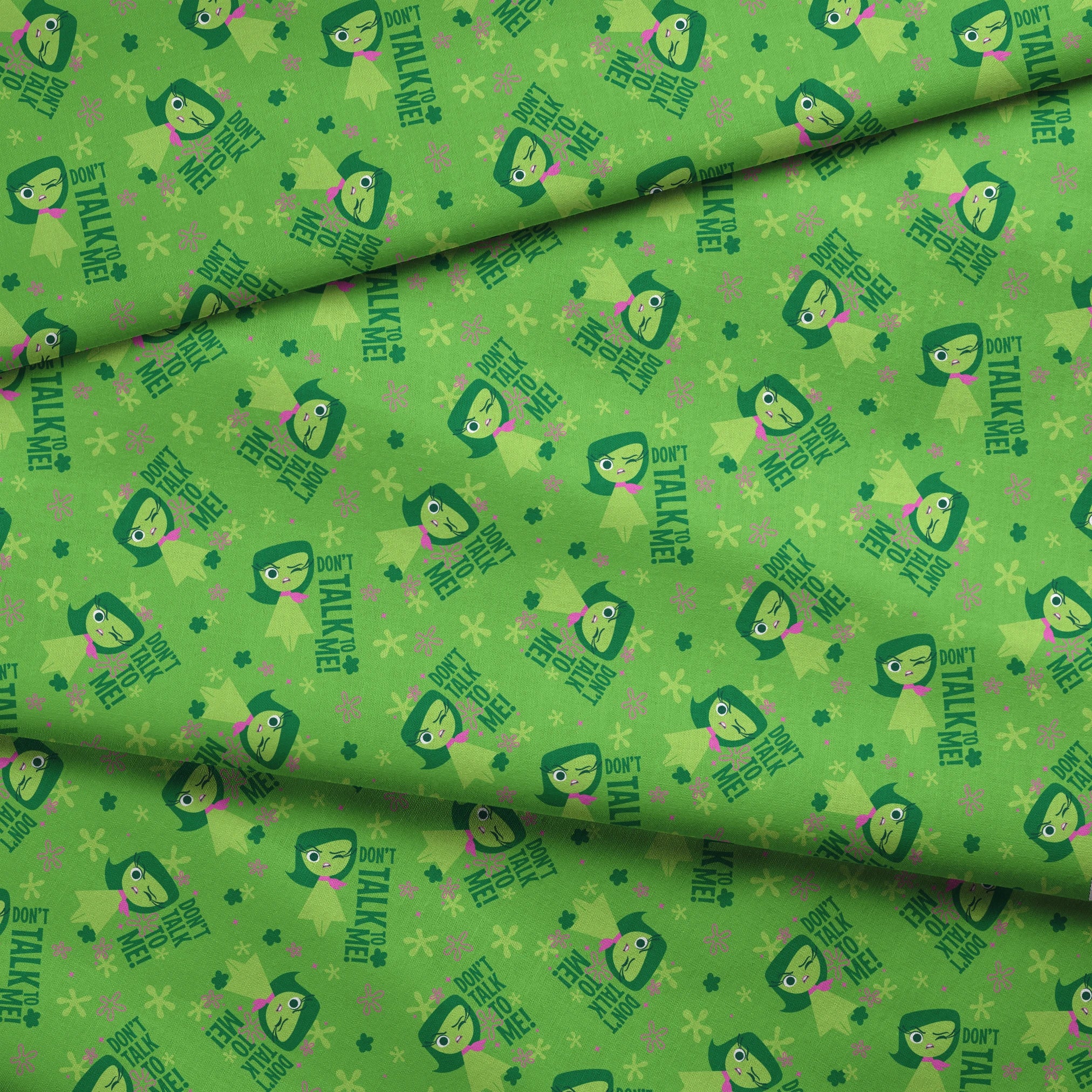 Green background with Disgust from Inside Out and "Don't Talk To Me" text, featuring stars and floral elements fabric fold mockup