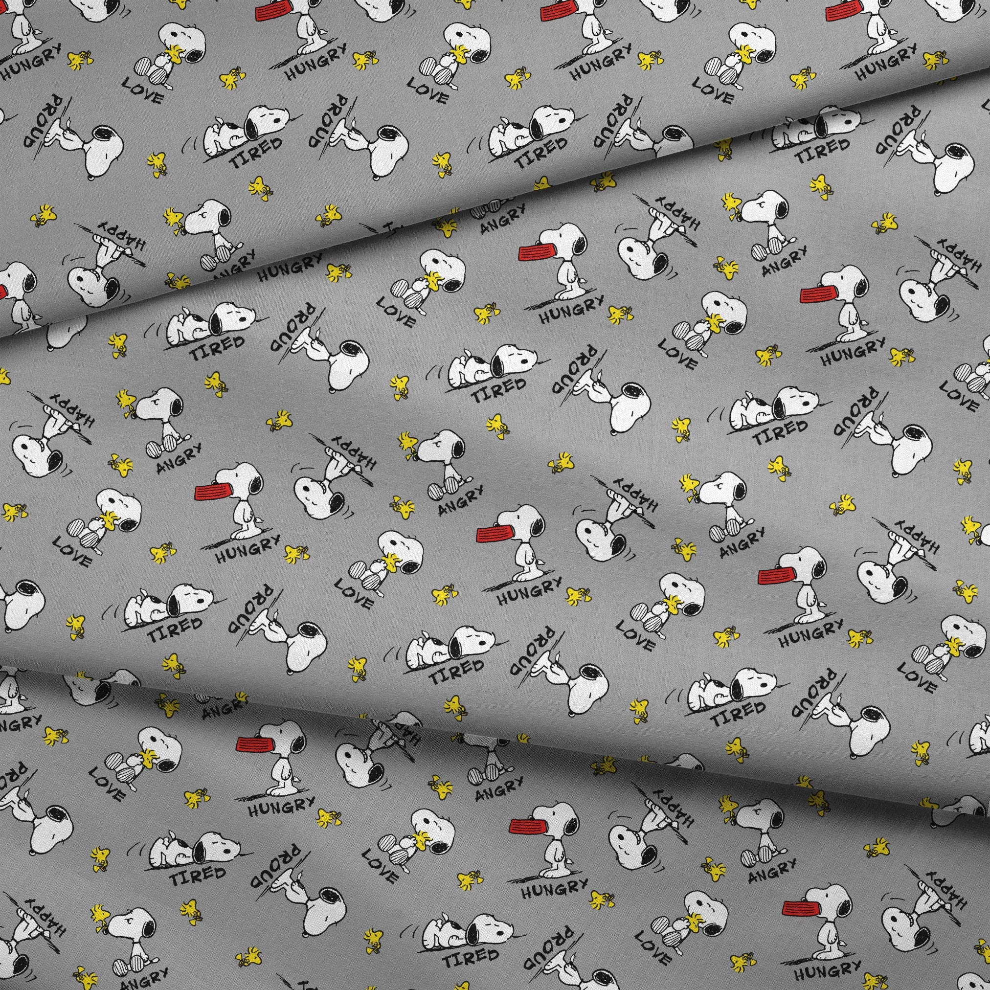 Snoopy cartoon pattern on gray background with emotions like "Hungry" and "Love" with Woodstock fabric fold mockup