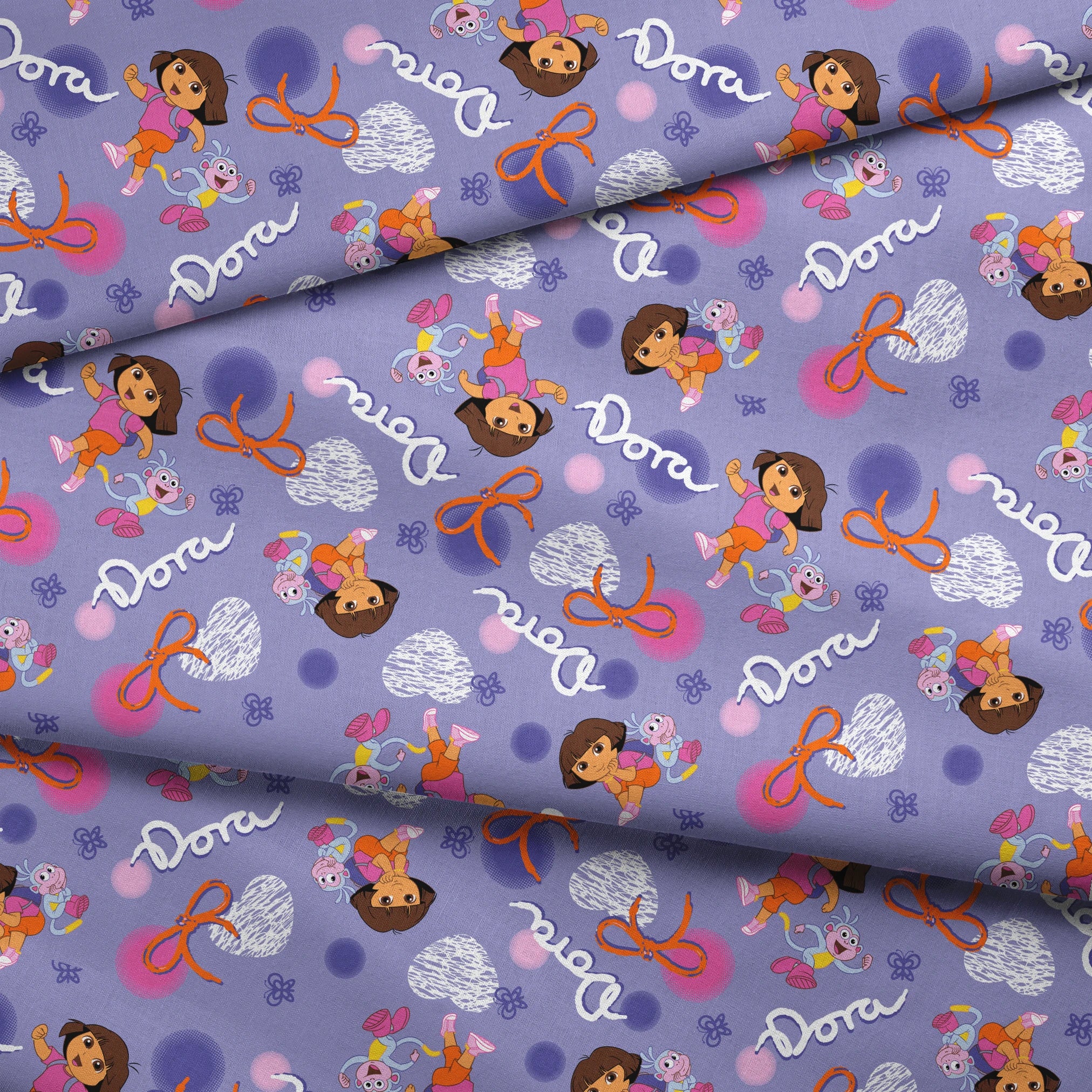Cartoon pattern featuring Dora the Explorer, Boots the monkey, and other characters on purple background with bows and clouds. fabric fold mockup