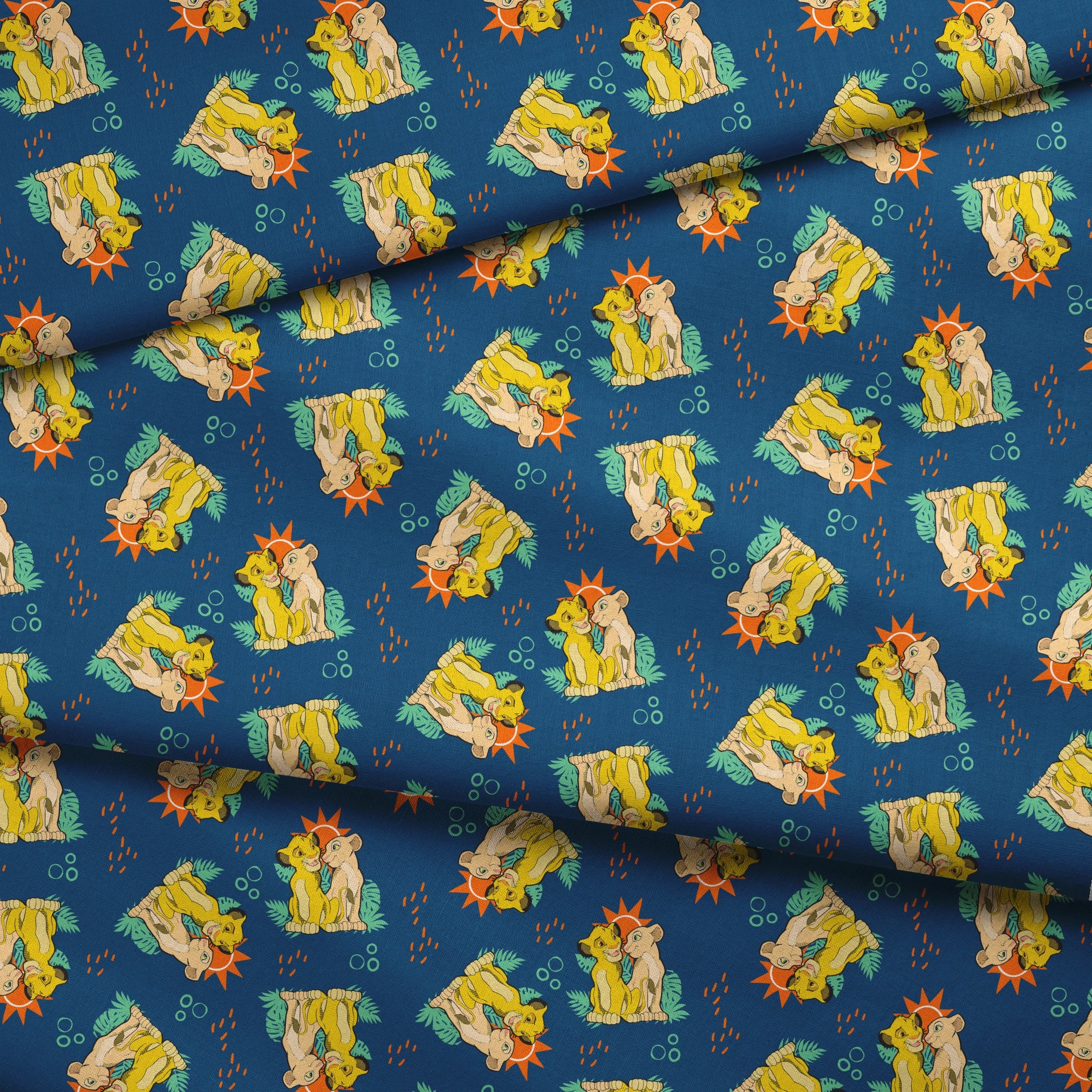 Yellow cartoon lions and pale yellow animals on teal background with tropical leaves, orange sun shapes and bubbles. fabric fold mockup