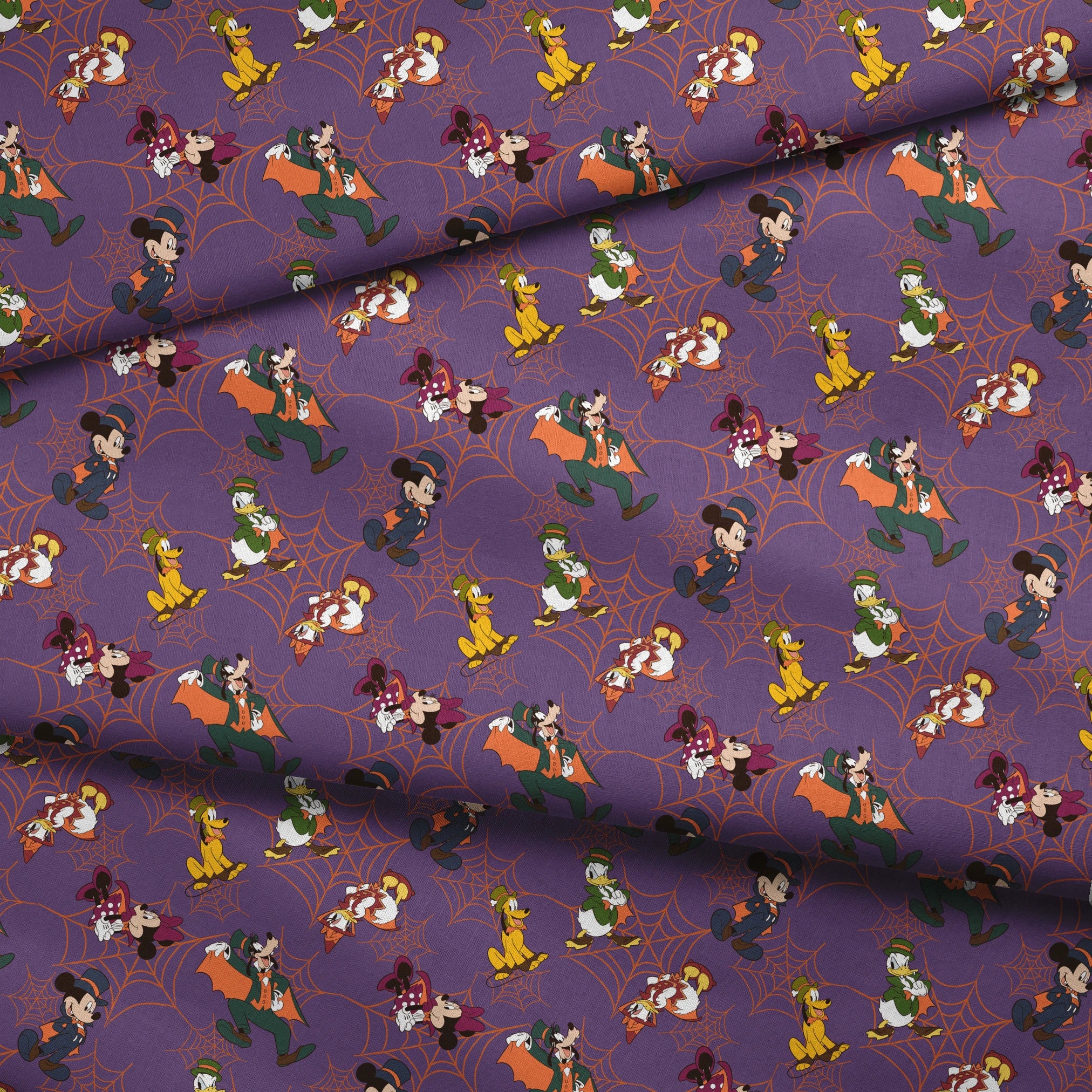 Disney cartoon characters in Halloween costumes on purple background with orange spider webs fabric fold mockup
