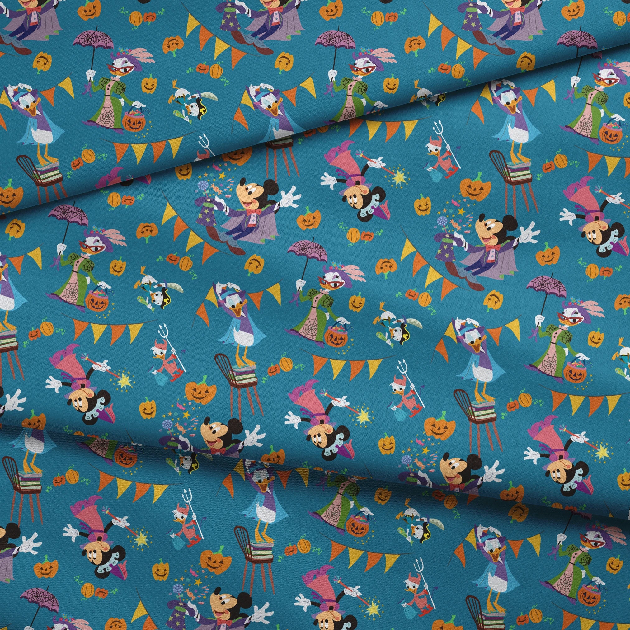 Whimsical Halloween pattern with Disney characters in costumes, pumpkins, and orange bunting on teal background. fabric fold mockup