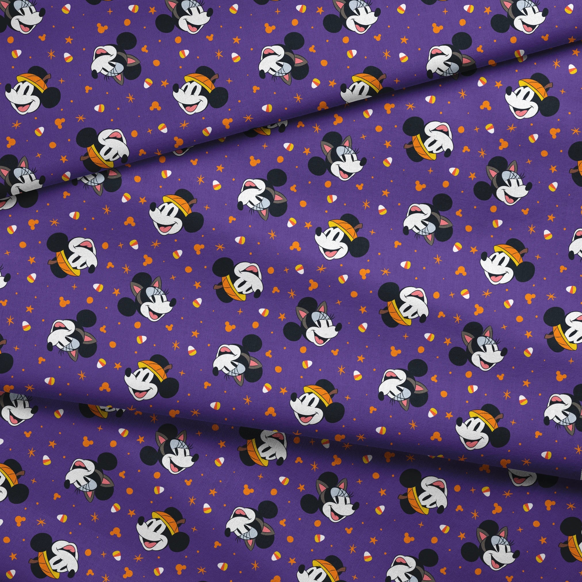 Mickey Mouse Halloween pattern with candy corn and stars on purple background fabric fold mockup