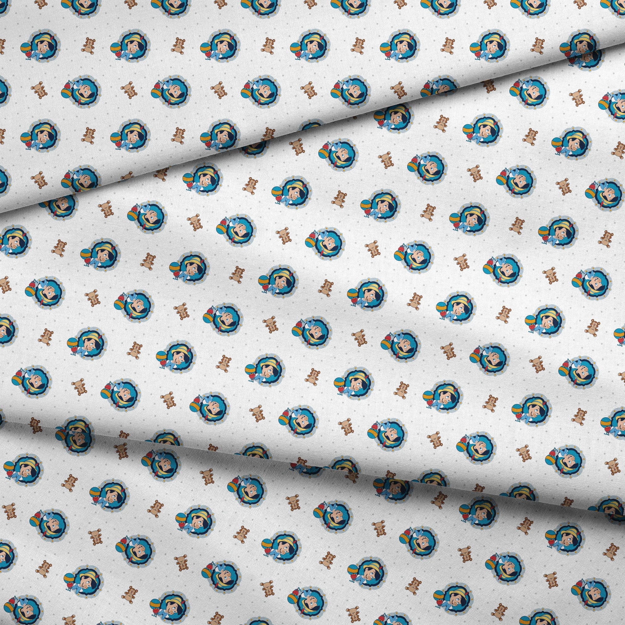 Repeating pattern of cartoon character in blue circle with teddy bears and colorful balls on light dotted background fabric fold mockup