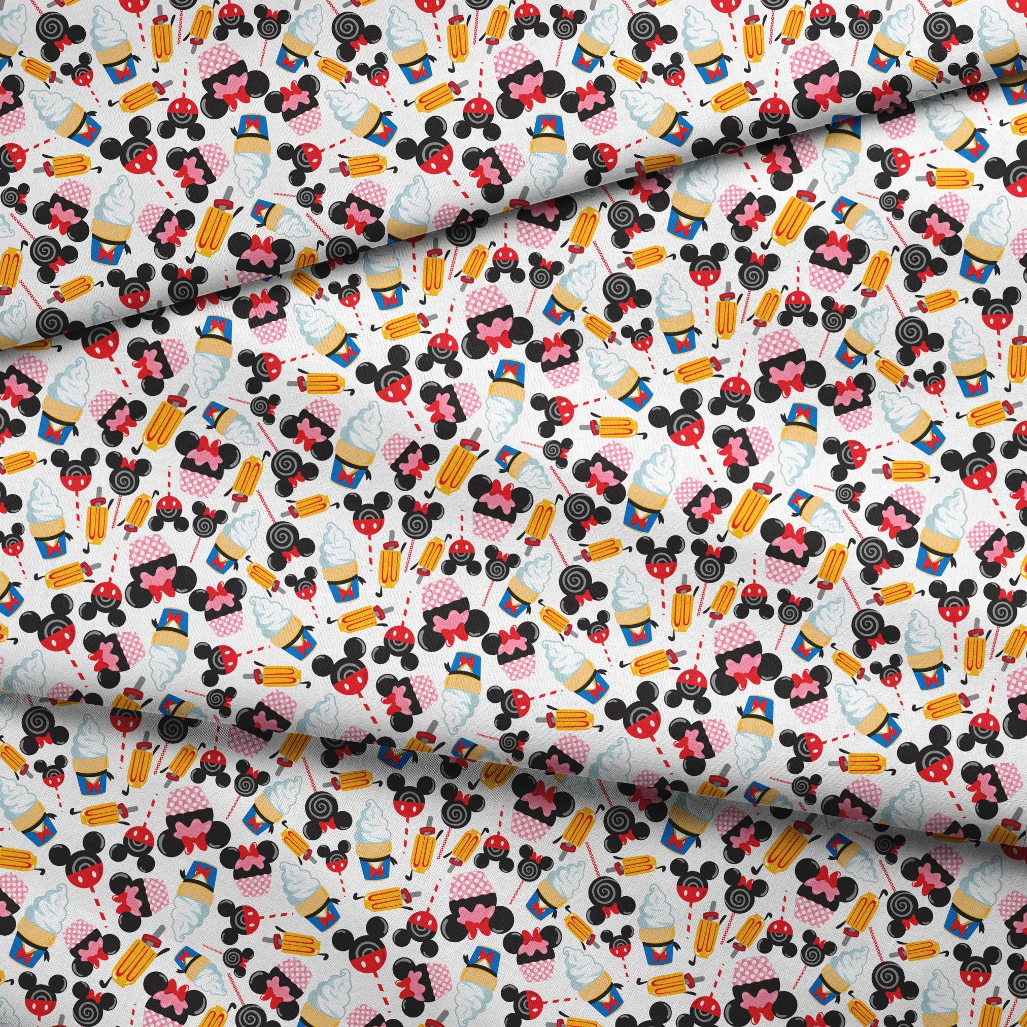 Disney-inspired pattern with ice cream cones and colorful swirled decorative elements on white background fabric fold mockup