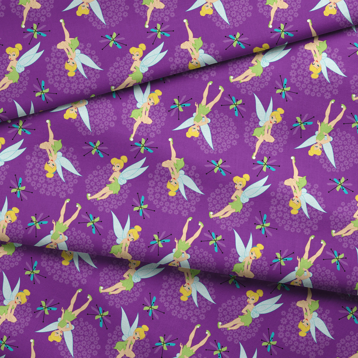 Repeating Tinker Bell pattern in green dresses on purple background fabric fold mockup