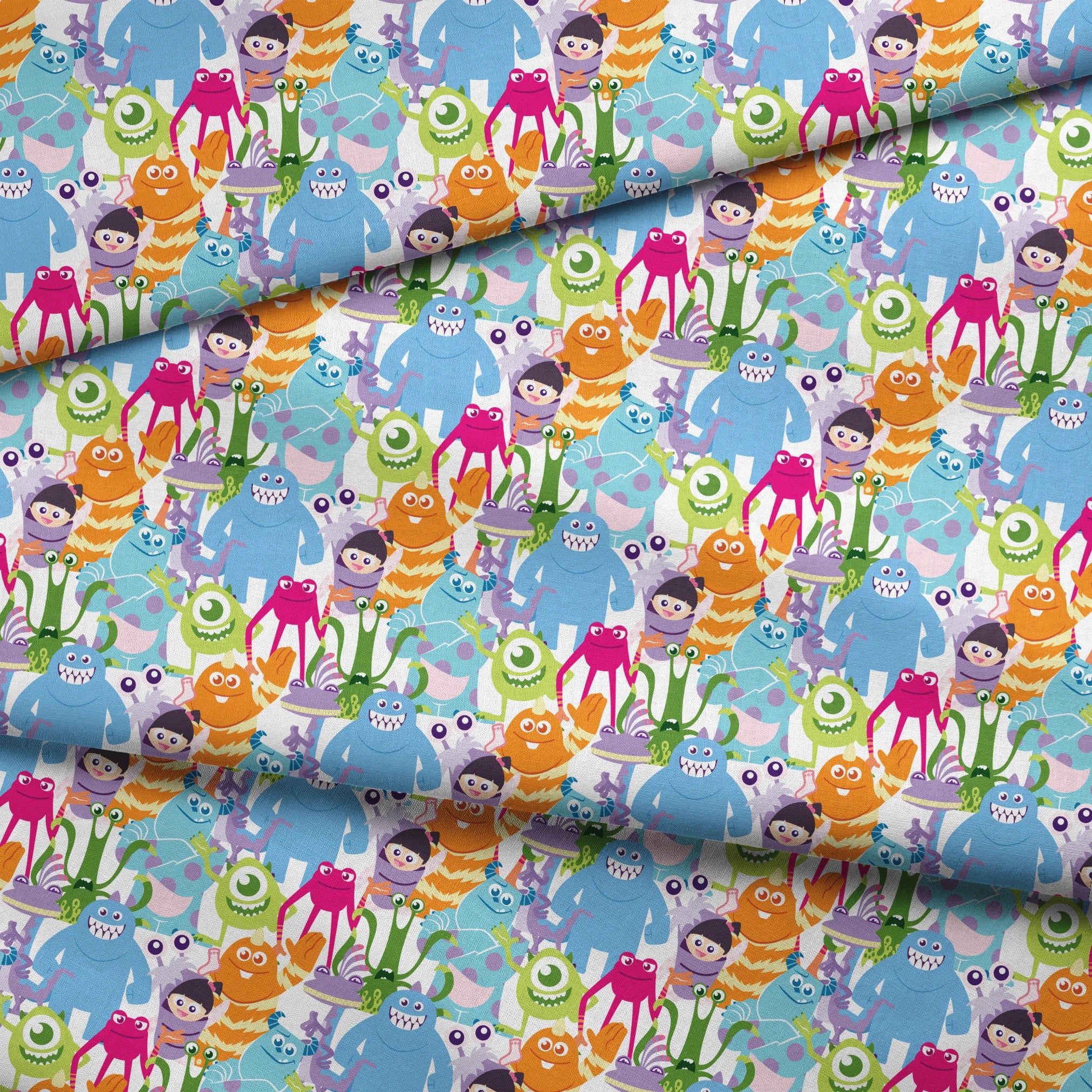 Colorful Monsters Inc pattern with various shapes, sizes and bright colors like blue, pink, orange and green. fabric fold mockup
