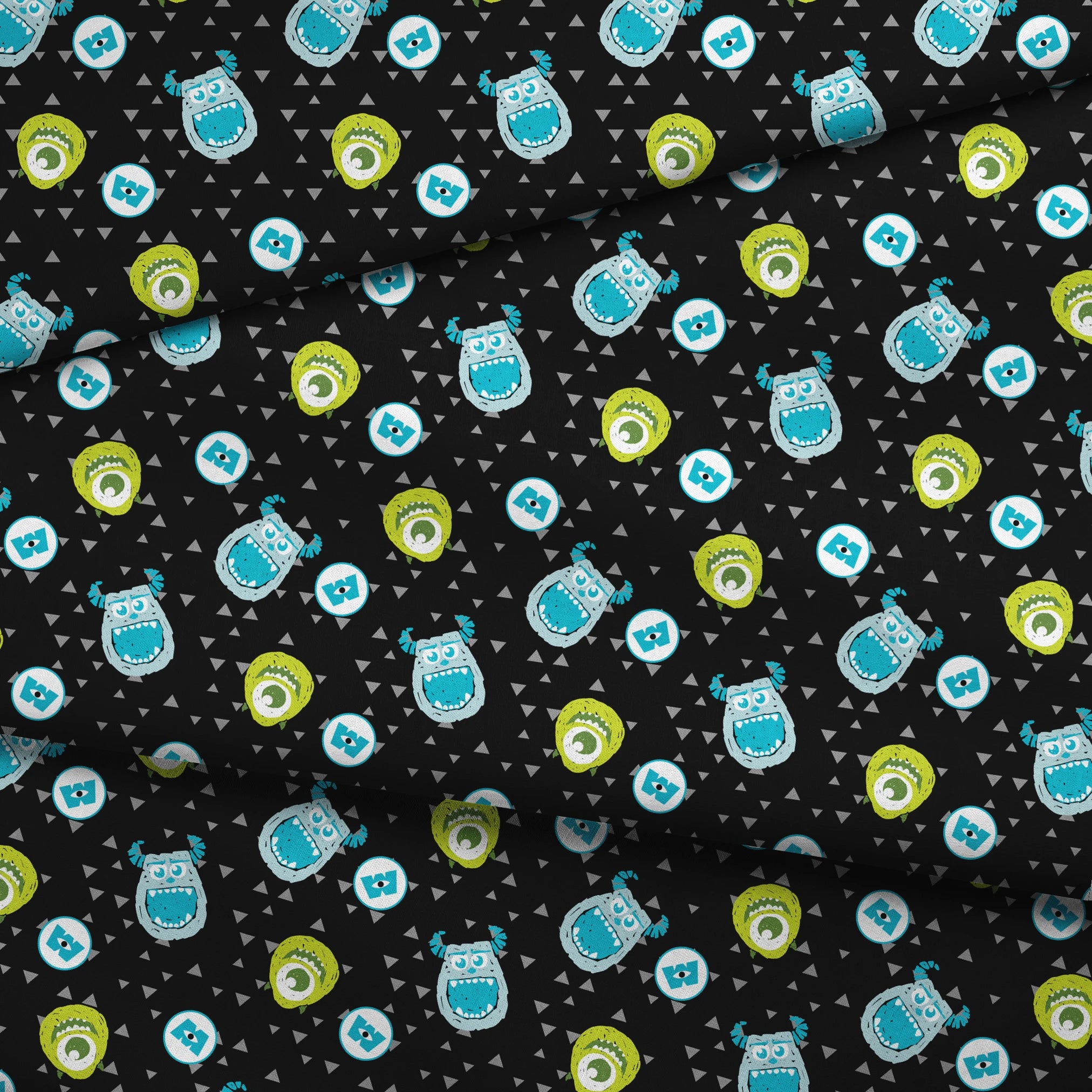 Monsters Inc pattern with Mike and Sulley on black background with gray triangles fabric fold mockup