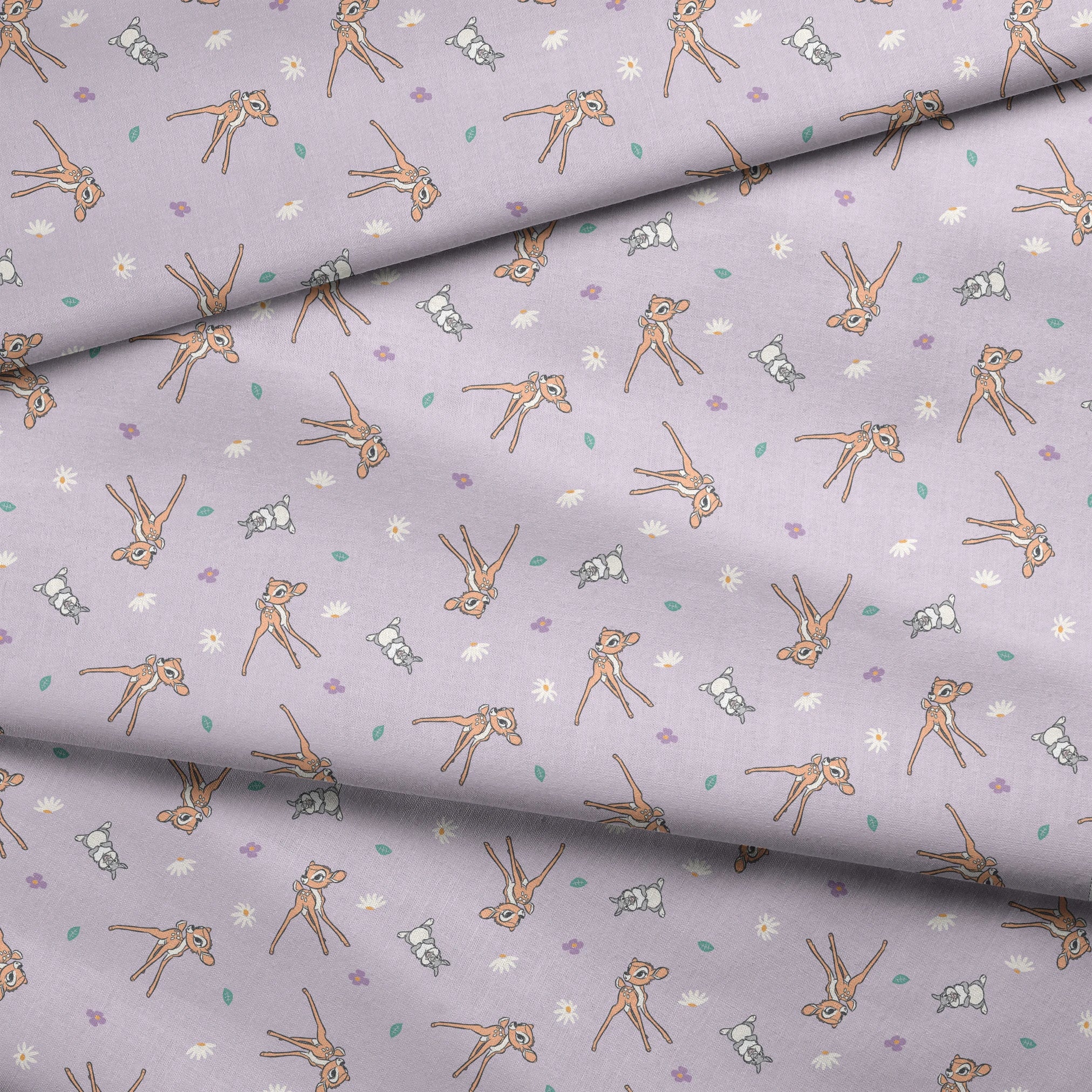 Seamless pattern of cartoon deer and bunnies with daisies and small flowers on lavender background fabric fold mockup